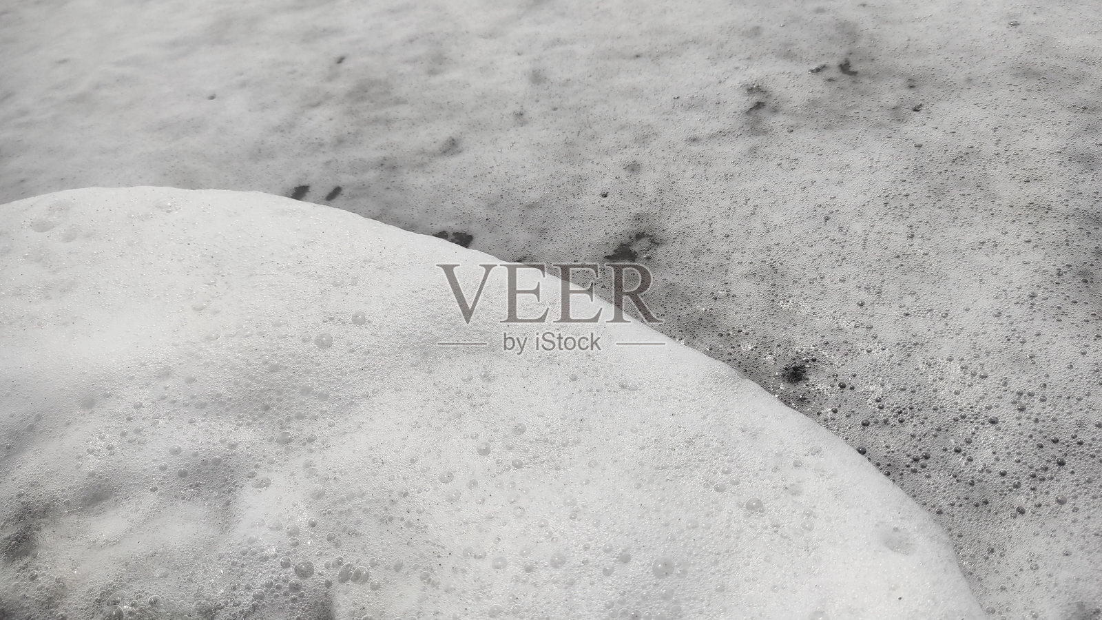 波浪水变成泡沫照片摄影图片