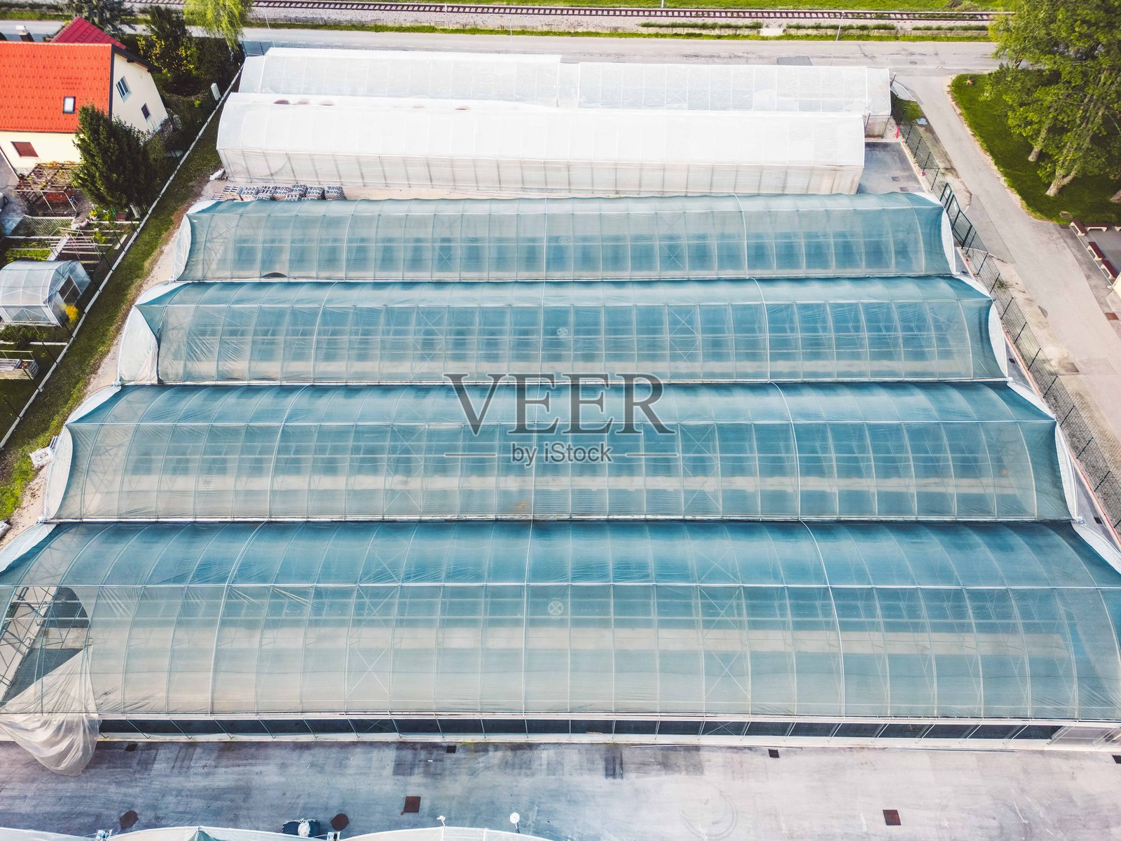 农业环境中的温室鸟瞰图照片摄影图片