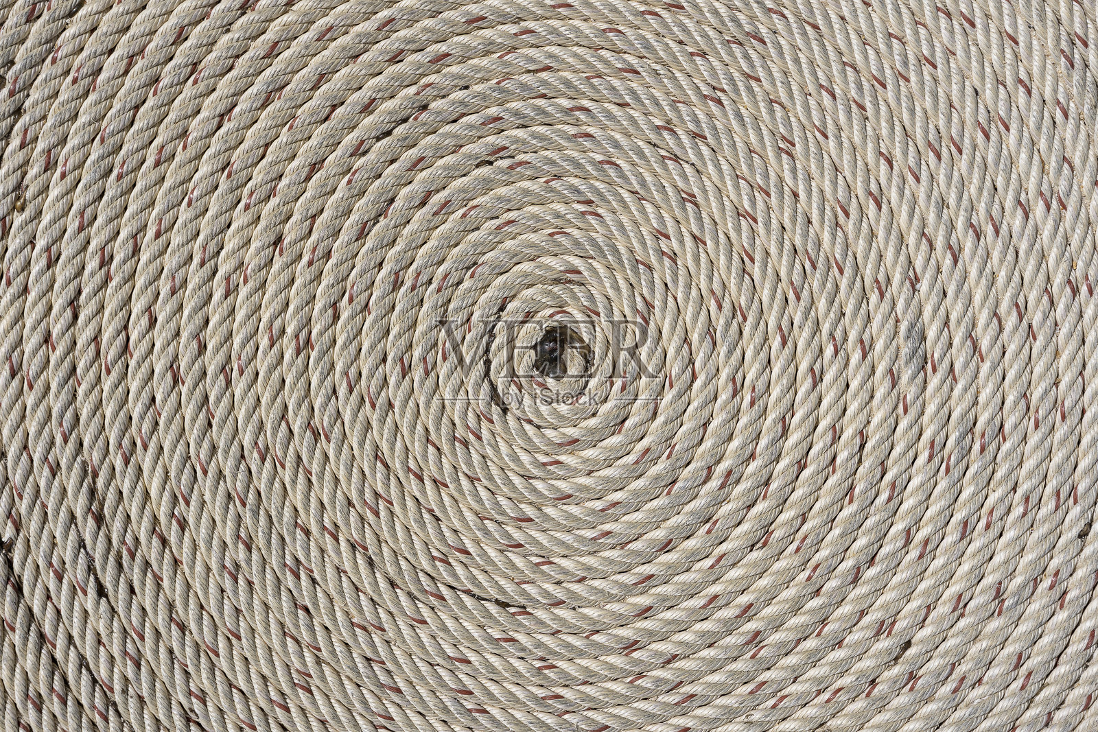 绳子折叠成螺旋形，特写镜头照片摄影图片