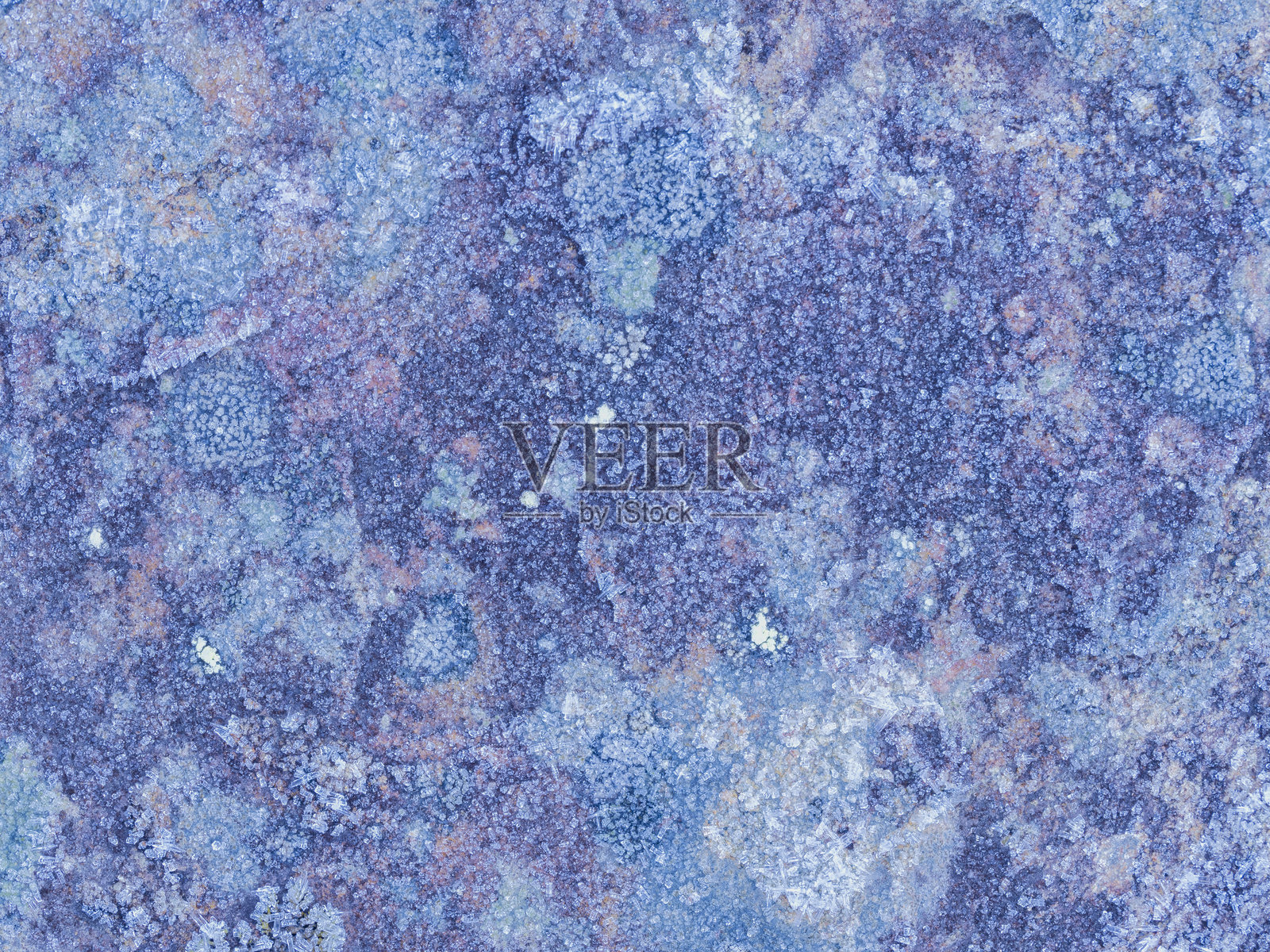 寒冷冬晨的冰覆盖岩石纹理背景照片摄影图片