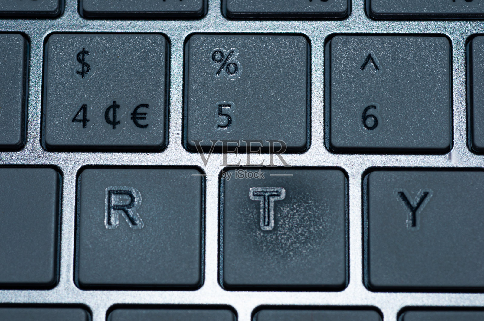 灰色键盘按键带有符号。照片摄影图片