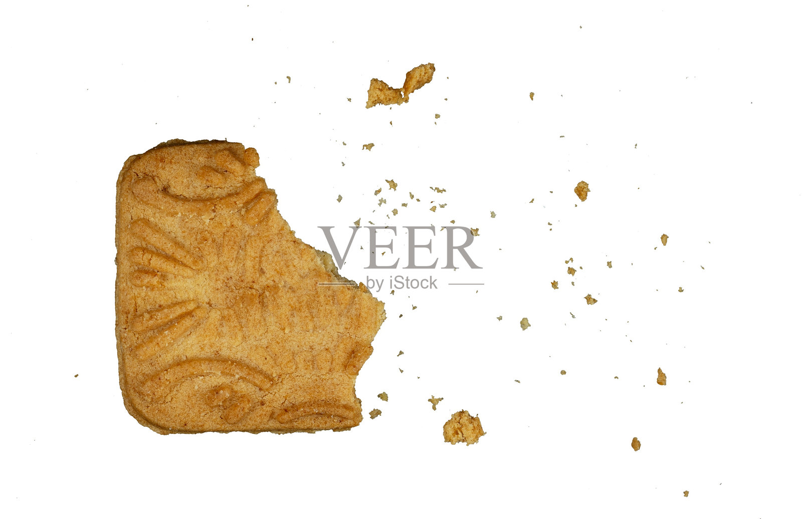 饼干一口咬下后，碎屑四散照片摄影图片