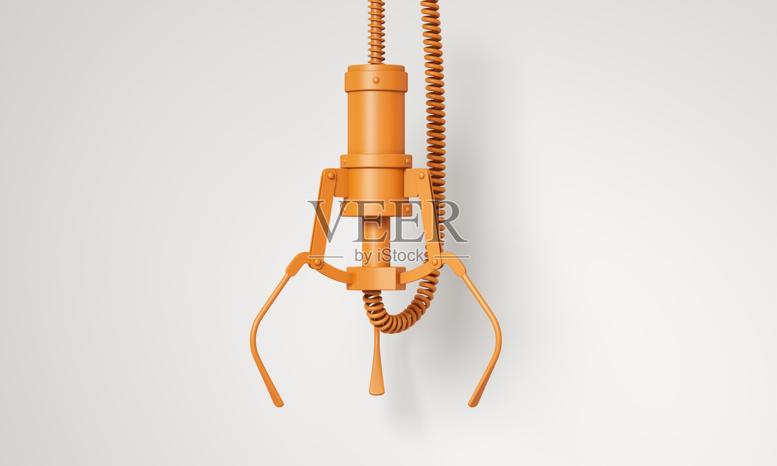 橙色机器人爪子在灰色背景上照片摄影图片