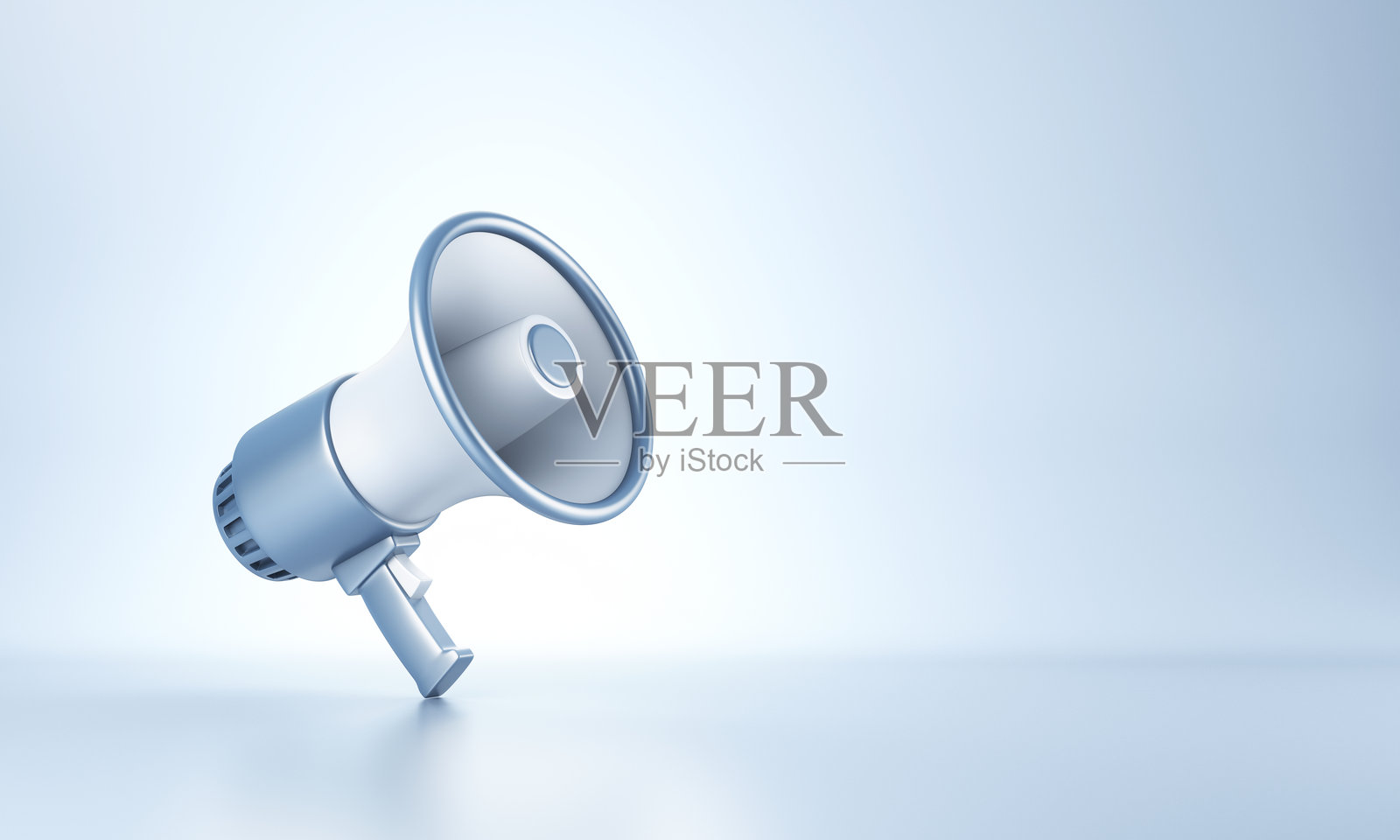 蓝色扩音器在蓝色背景上照片摄影图片
