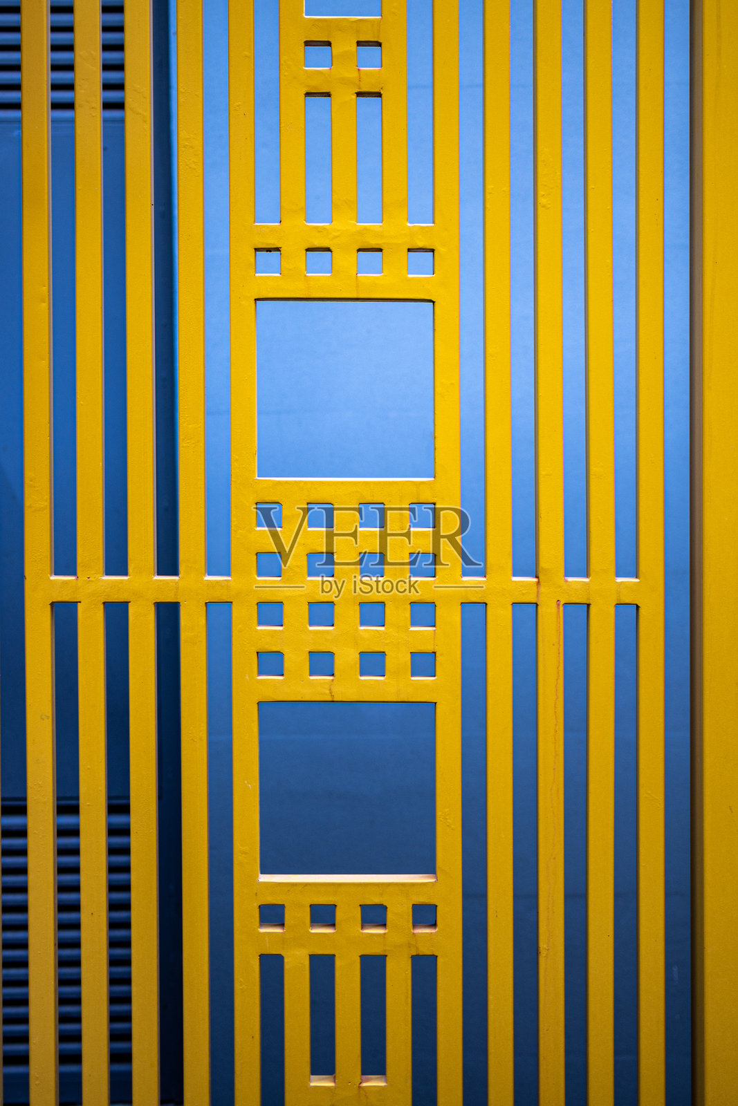 黄色围栏的一部分作为背景照片摄影图片