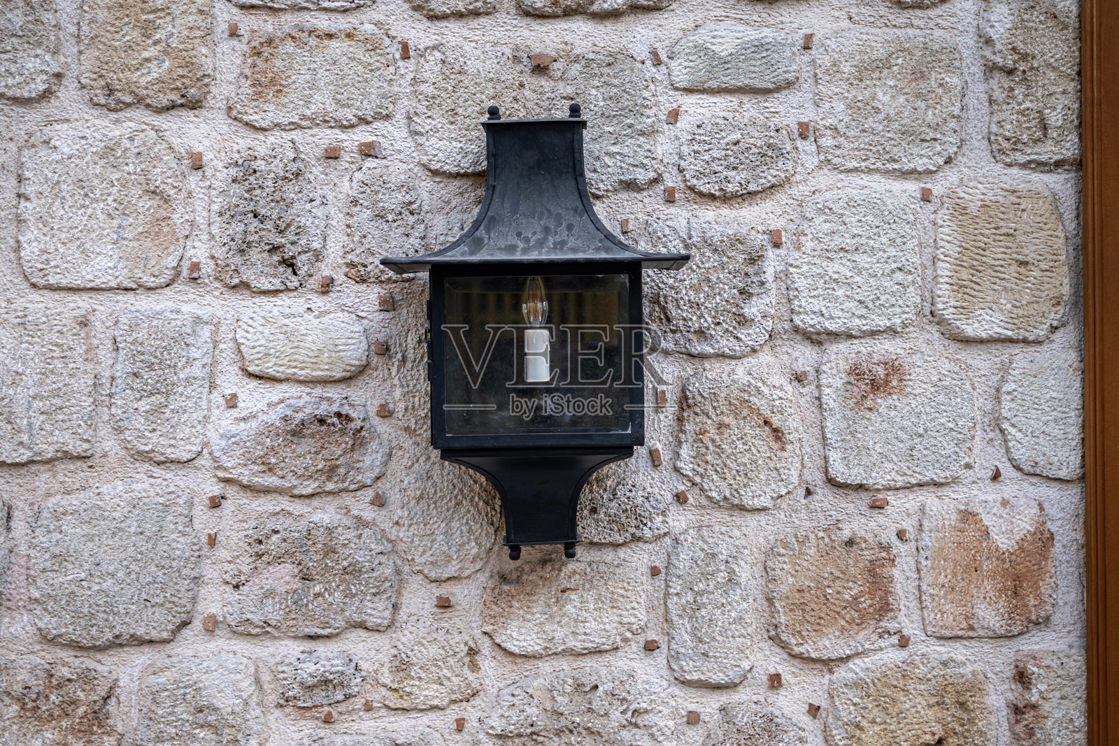 石质背景。风化的石墙纹理照片摄影图片