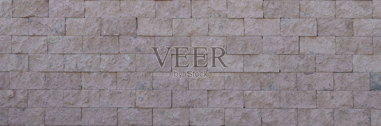 灰色和米色调的石墙背景纹理照片摄影图片