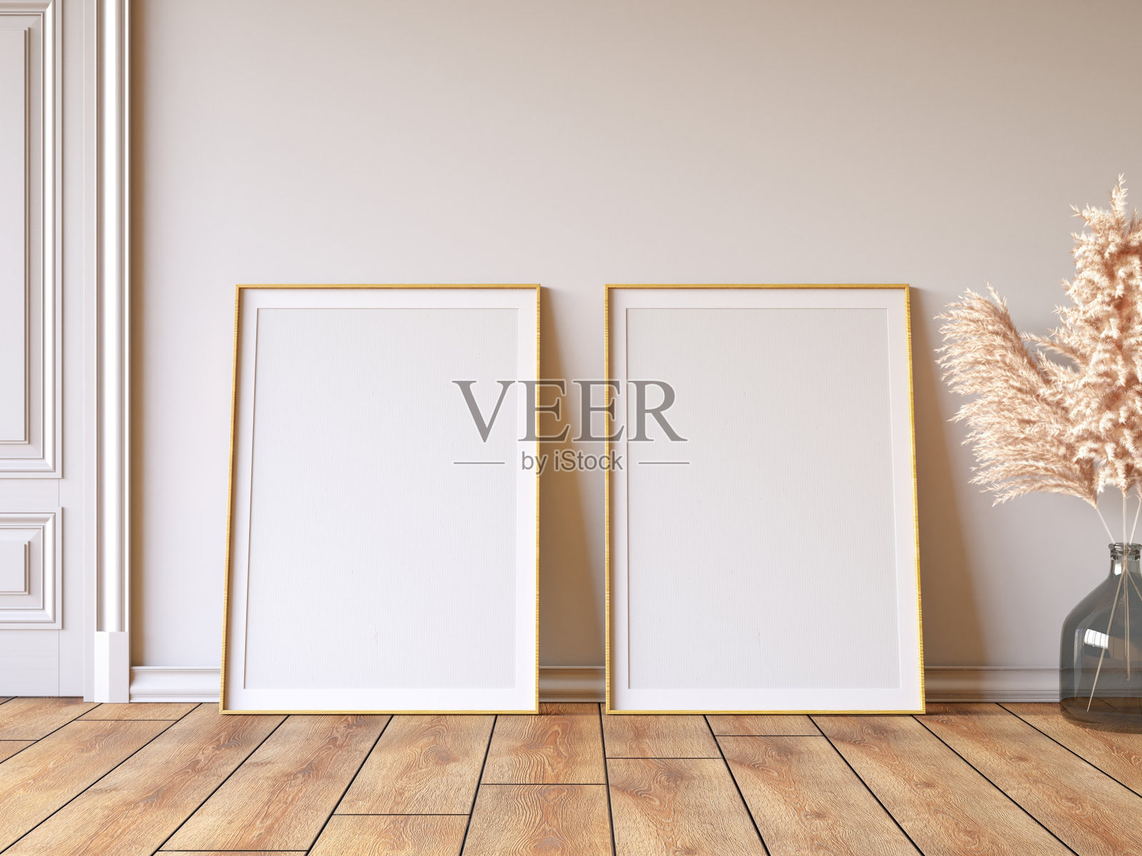 两个空的样式画框放在白色墙壁前的镶木地板上照片摄影图片