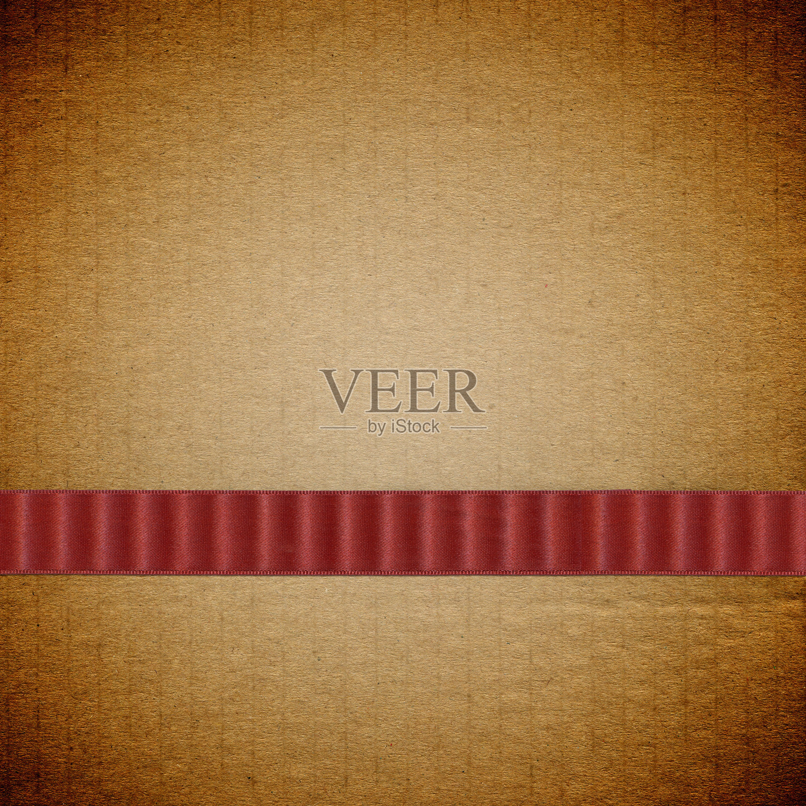 棕色纸背景上的红色丝带照片摄影图片