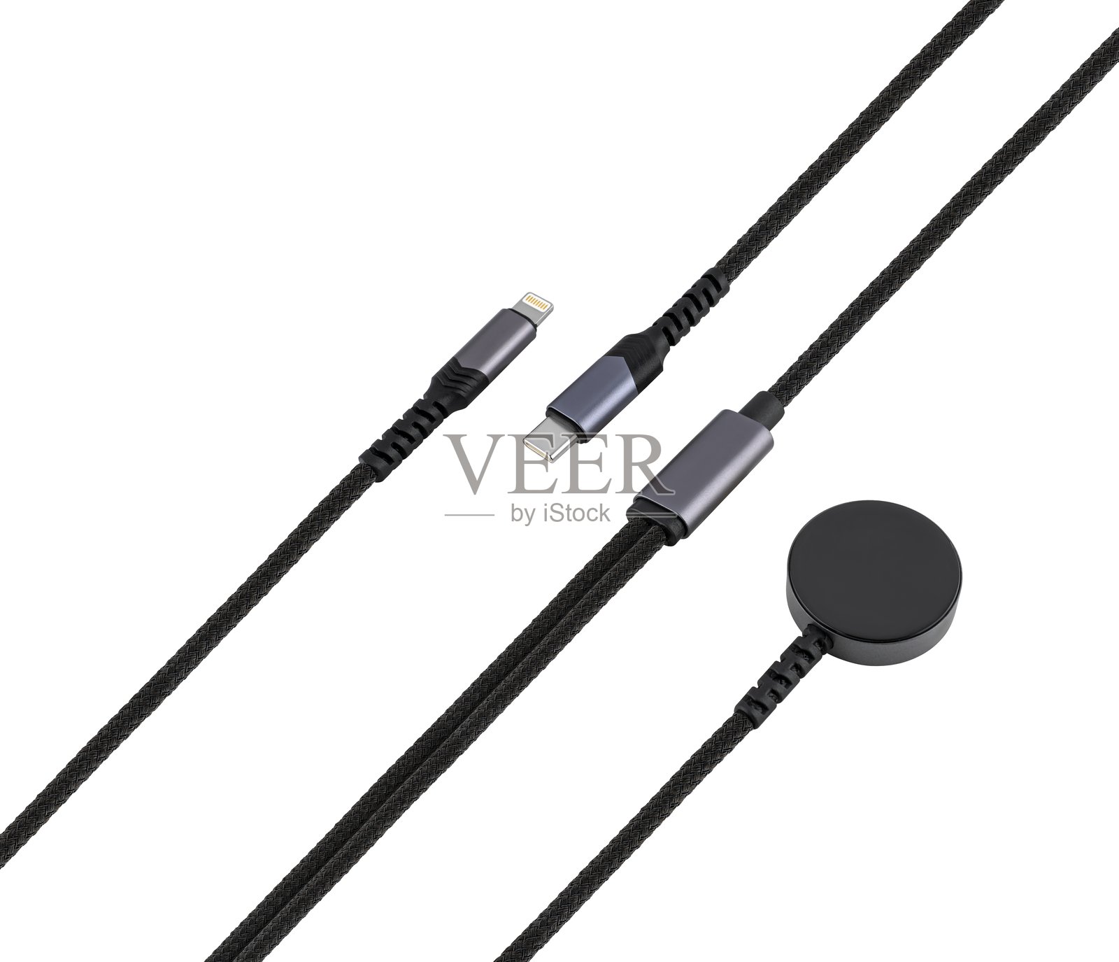 带有Type-C、Lightning连接器和无线充电模块的电缆。照片摄影图片