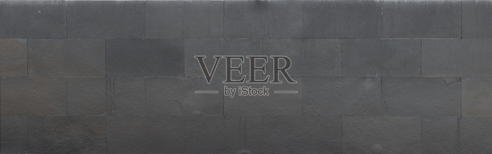 深色板岩墙面纹理背景，呈矩形块状照片摄影图片