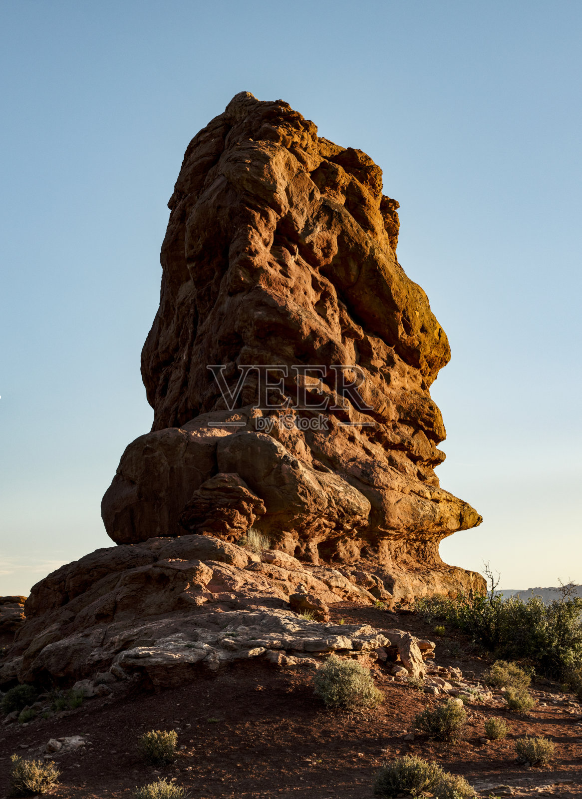 拱门国家公园日落光辉下的壮丽岩石 formations照片摄影图片