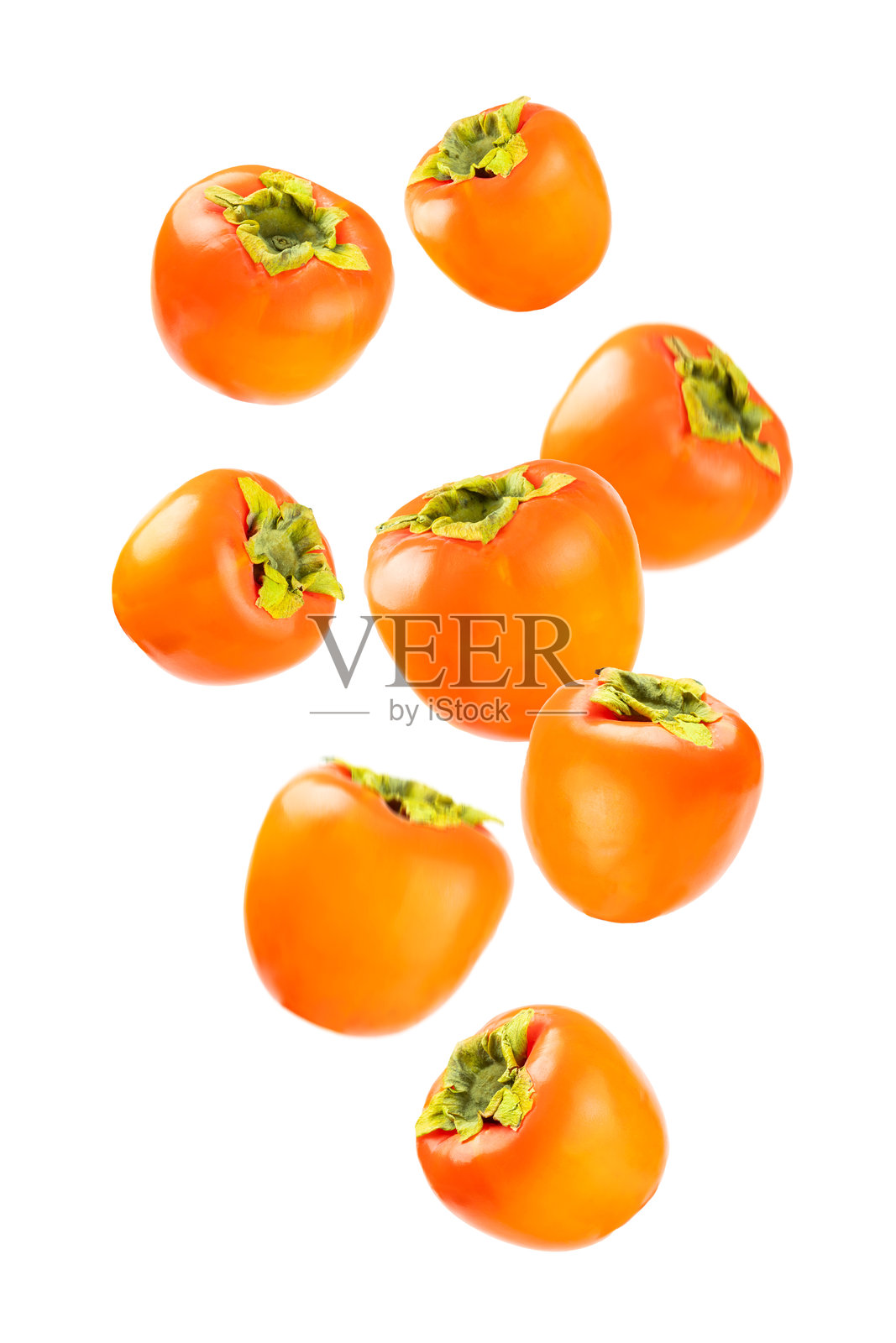 白色背景上的柿子。柿子果实。成熟、多汁、甜美的柿子果片。素食。果园。特写。照片摄影图片