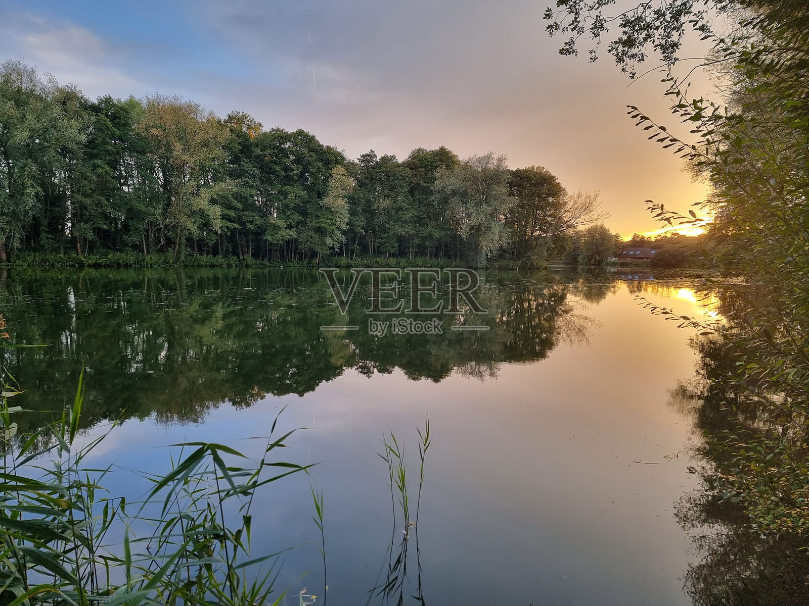日落倒影照片摄影图片