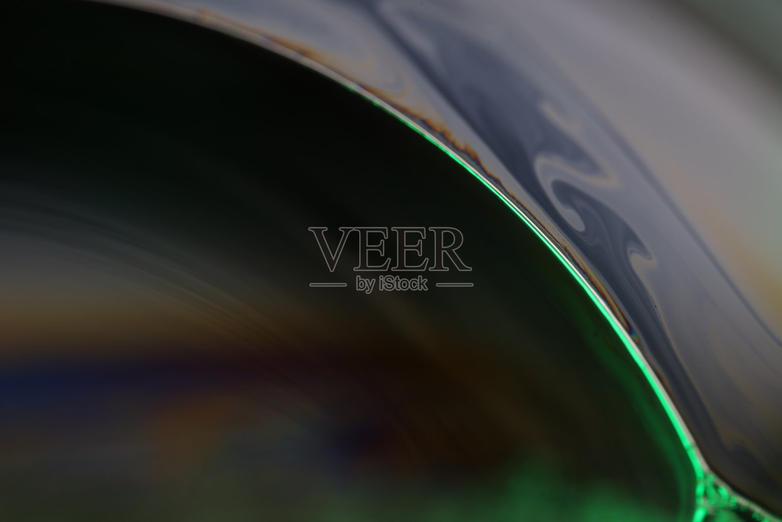 显微镜下超光滑液体表面的运动，五彩斑斓的水形态照片摄影图片