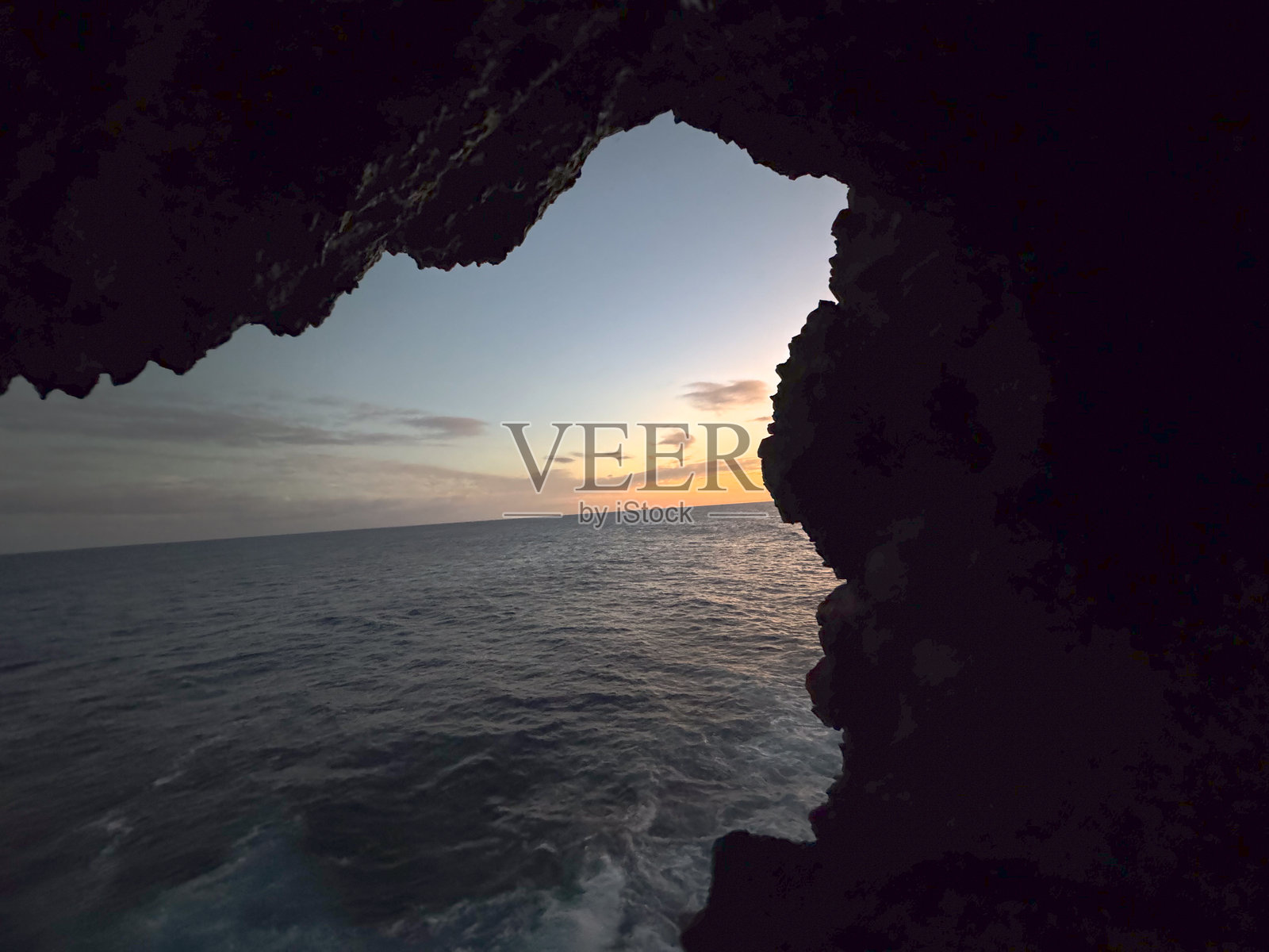 洞穴日落照片摄影图片