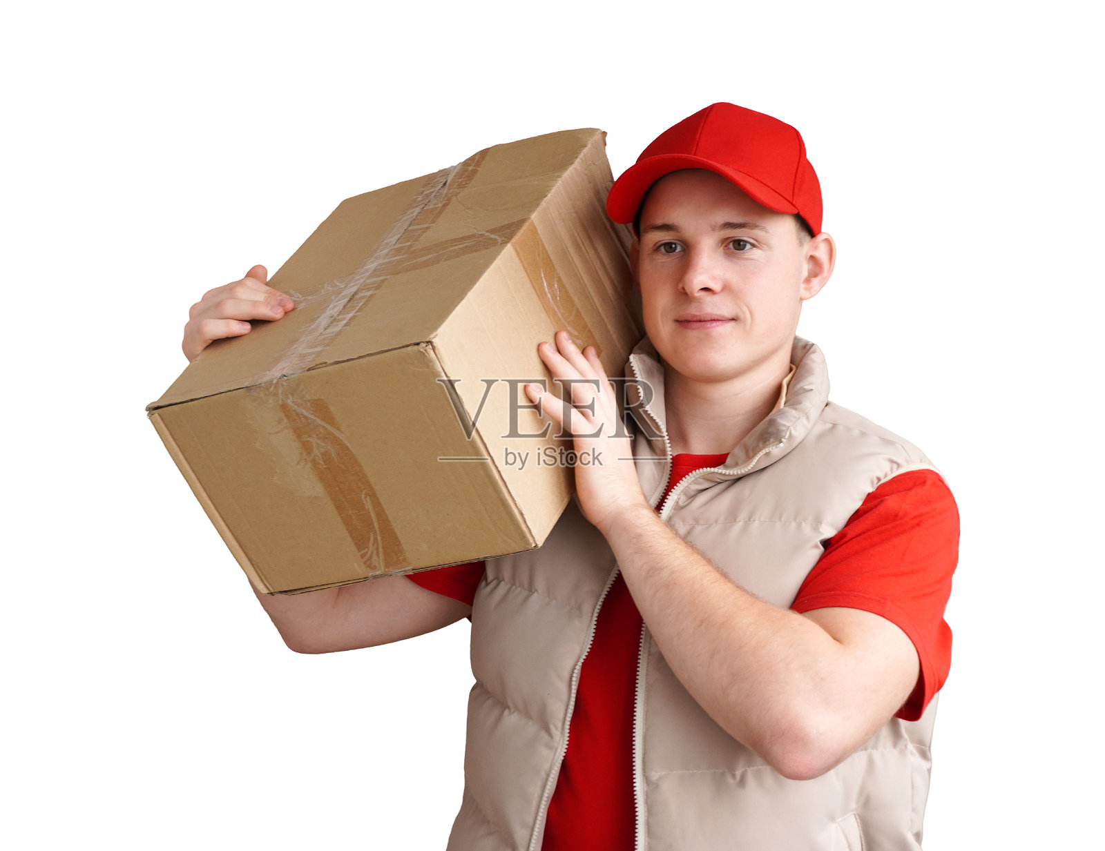 送货员肩上扛着纸箱照片摄影图片