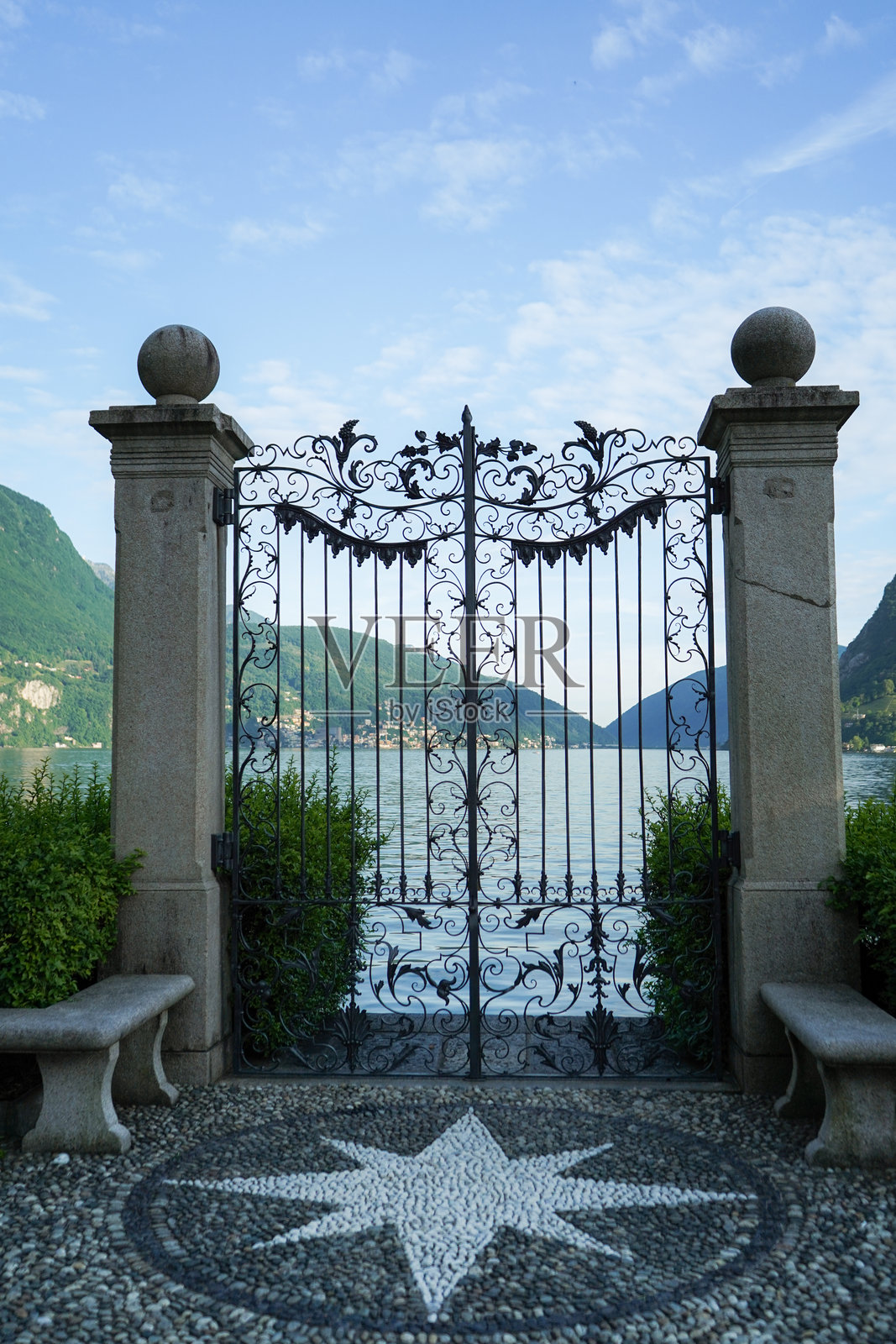 卢加诺湖上的栅栏照片摄影图片