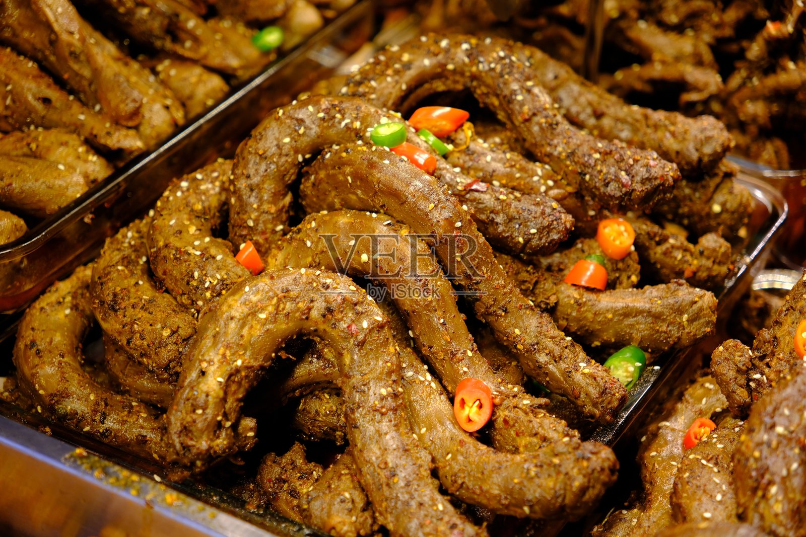 辣味鸭脖。腌制鸭脖。中国美食照片摄影图片