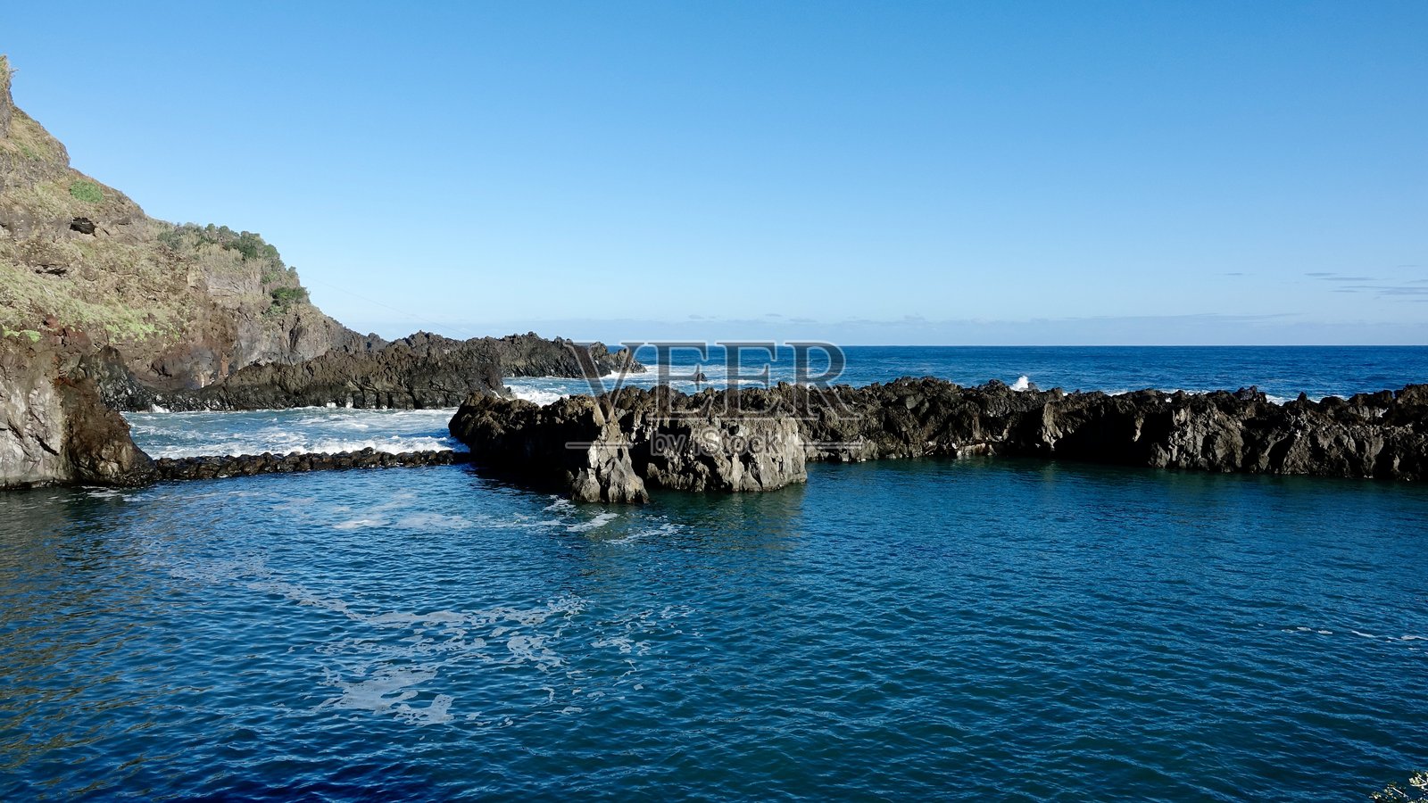 海岸上的岩石和石头照片摄影图片