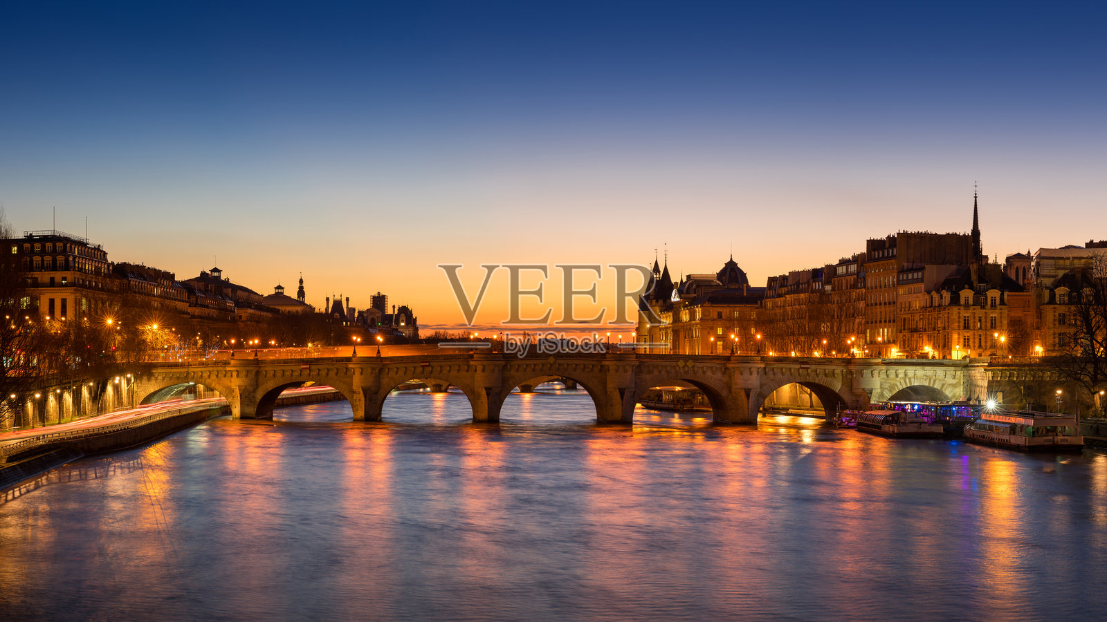 巴黎日出，背景是新桥和西岱岛。塞纳河岸是联合国教科文组织世界遗产。法国照片摄影图片