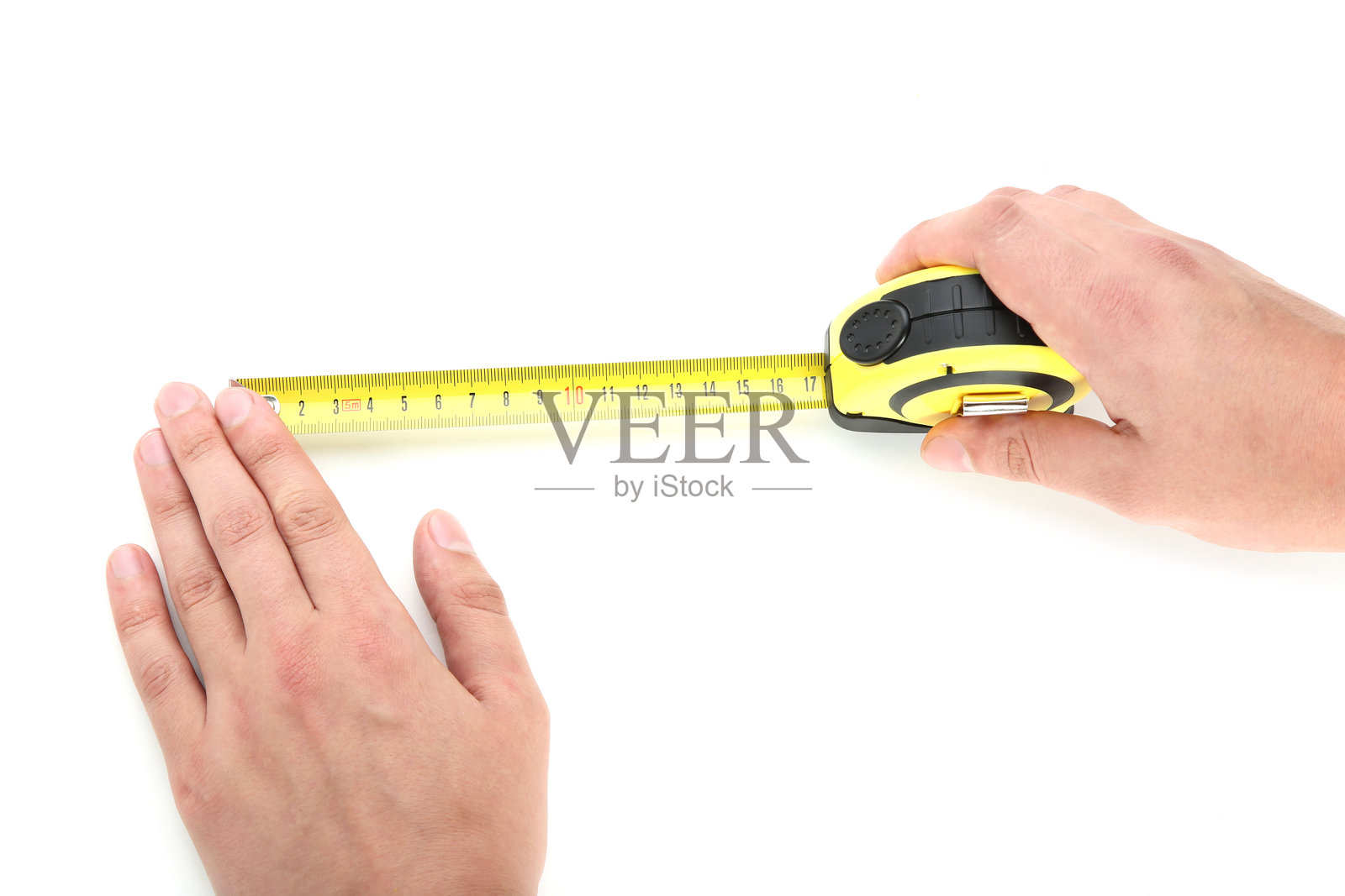 白色背景上手握建筑轮盘照片摄影图片