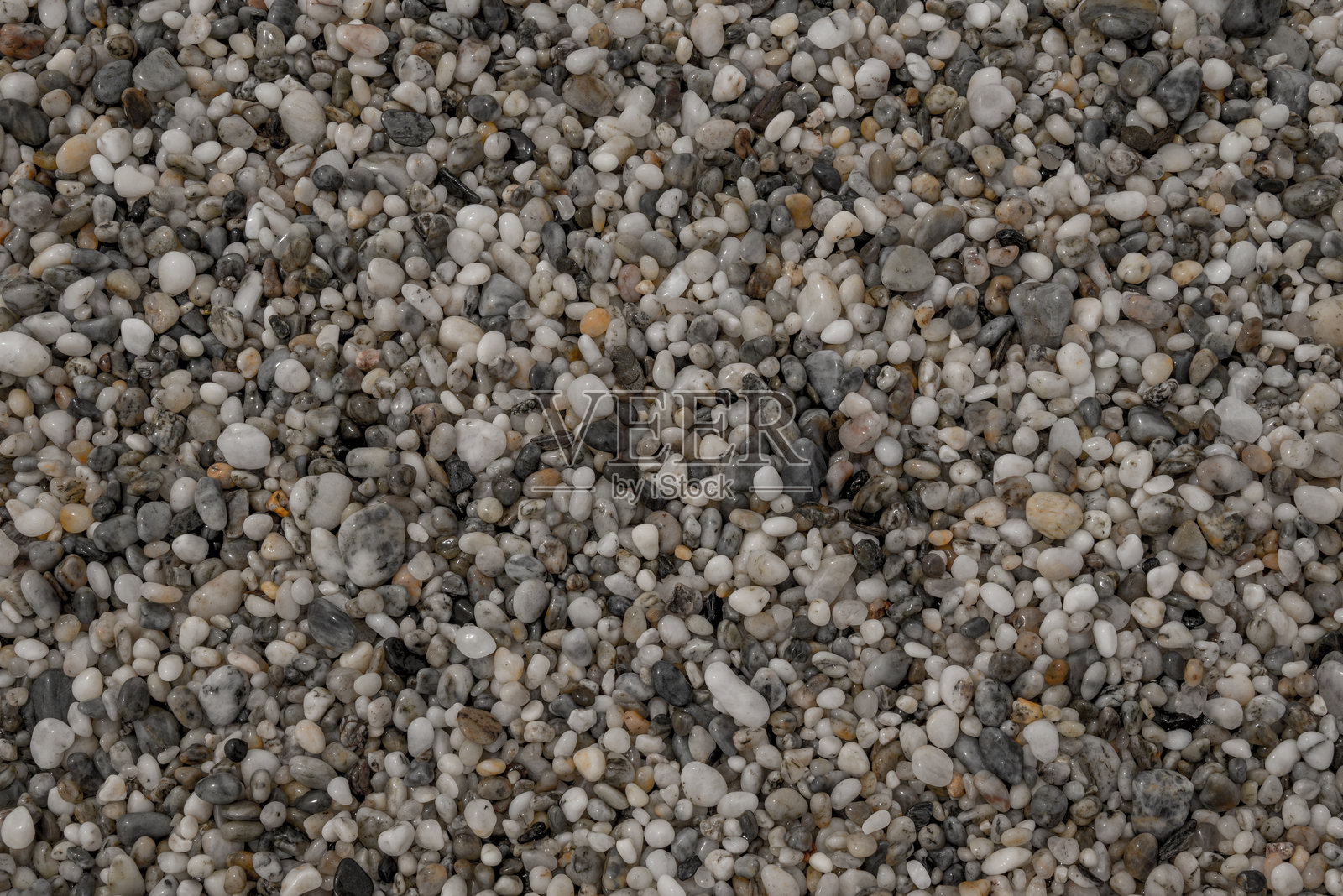 小海石卵石背景。多彩的抽象图案照片摄影图片