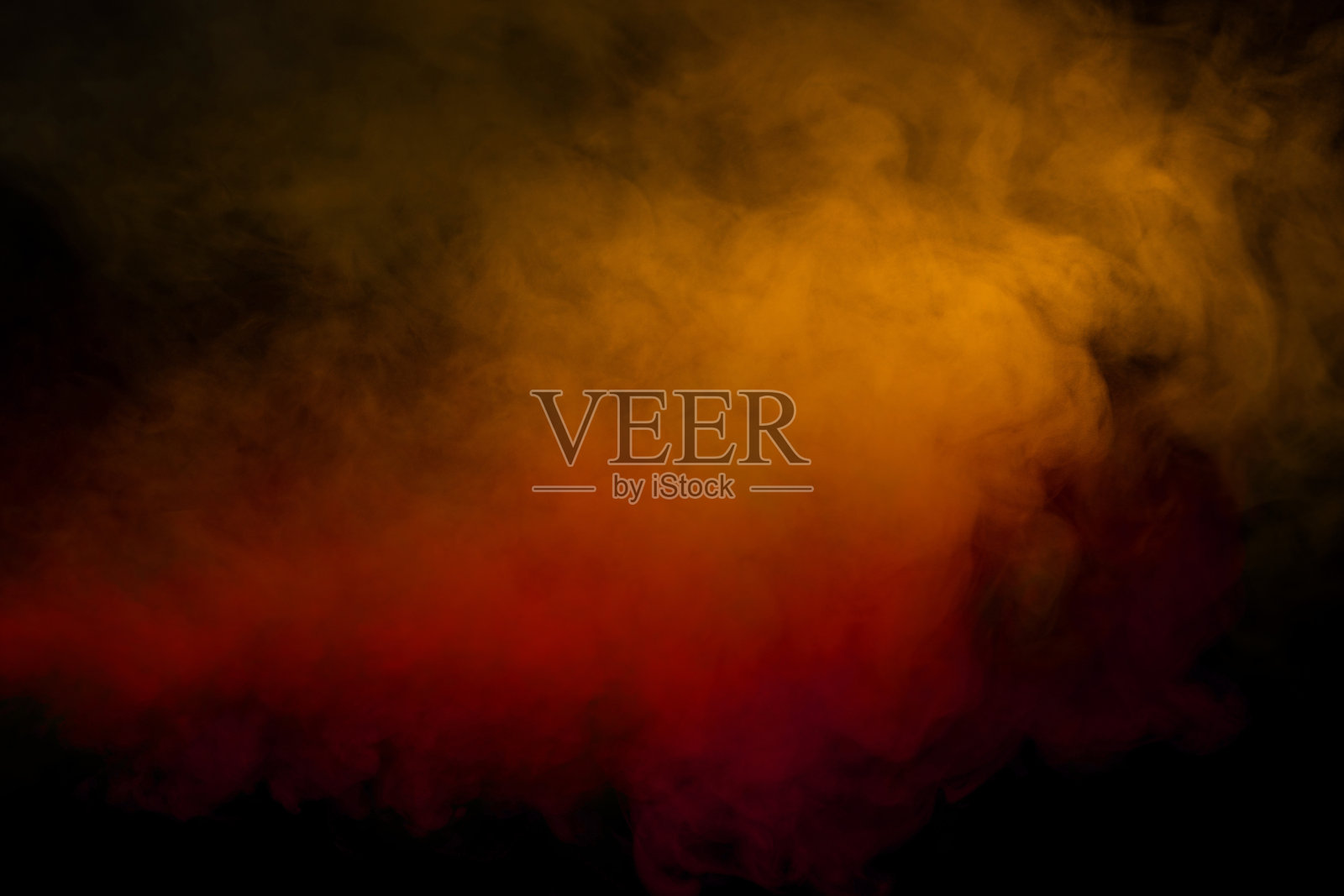 橙色和红色的蒸汽在黑色的背景。照片摄影图片