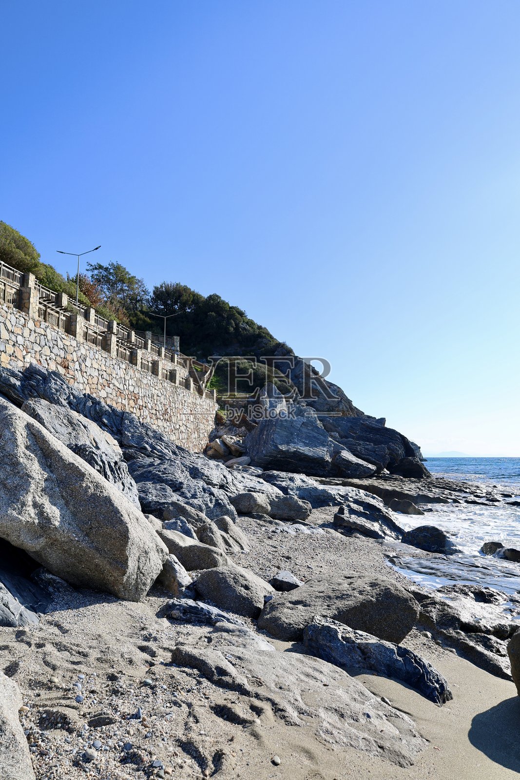 崎岖的海岸墙照片摄影图片