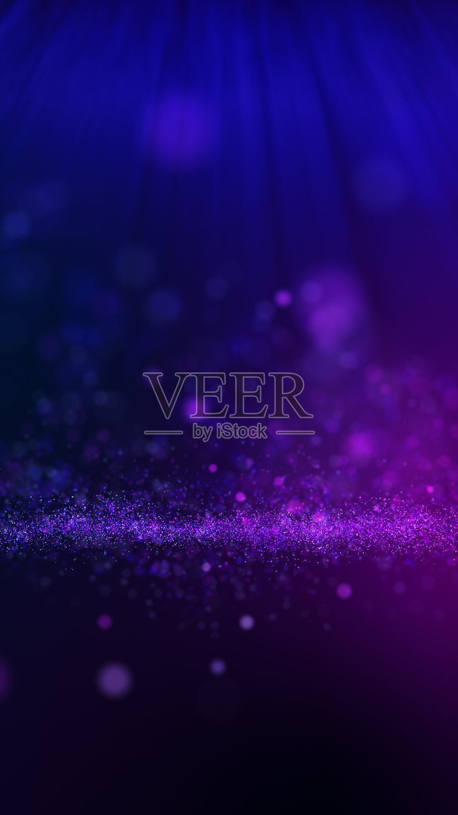 垂直视频，紫蓝色粒子背景，光芒闪耀。照片摄影图片