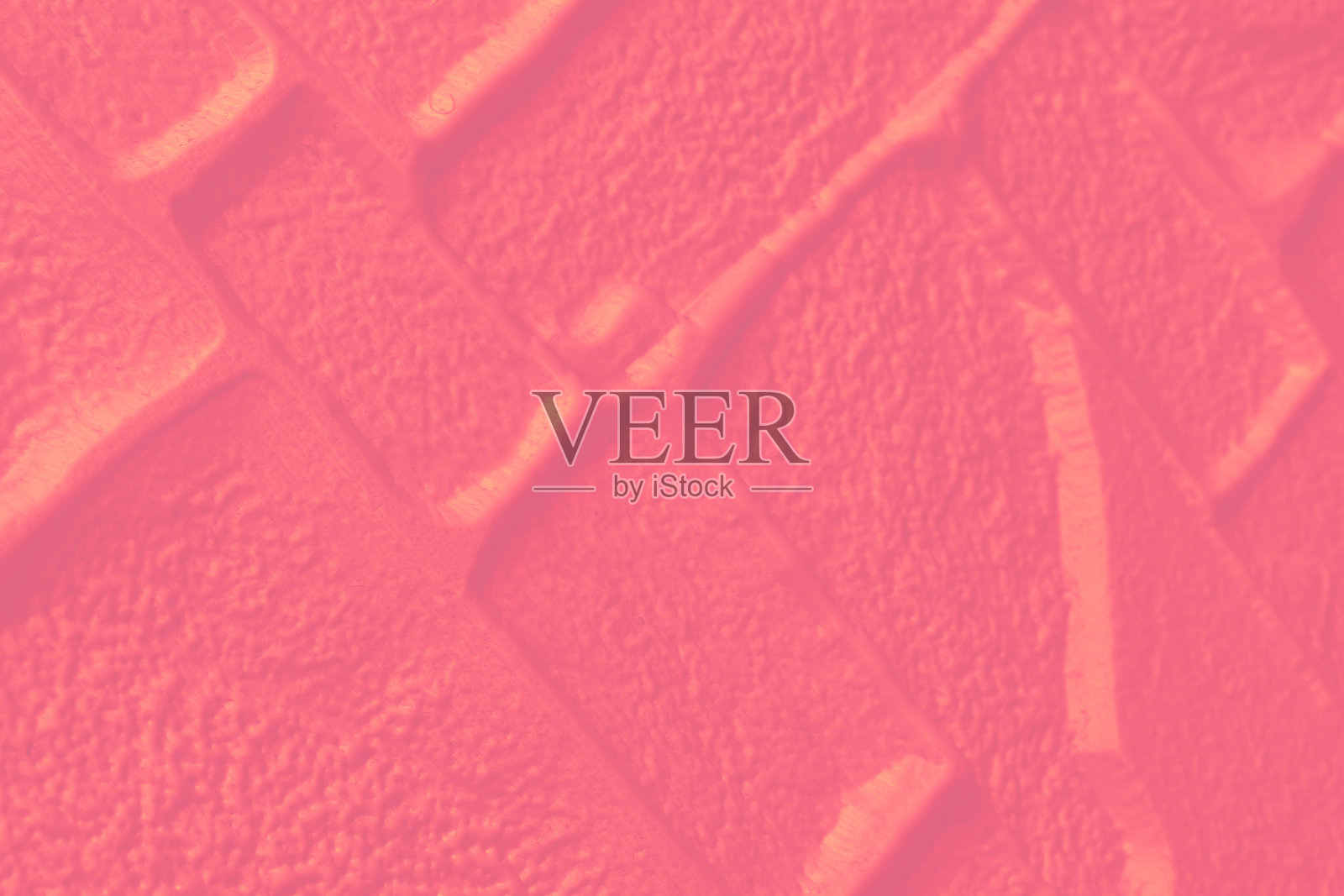 粉色模糊的波纹表面，带有凹槽的墙壁，凹陷，空心照片摄影图片