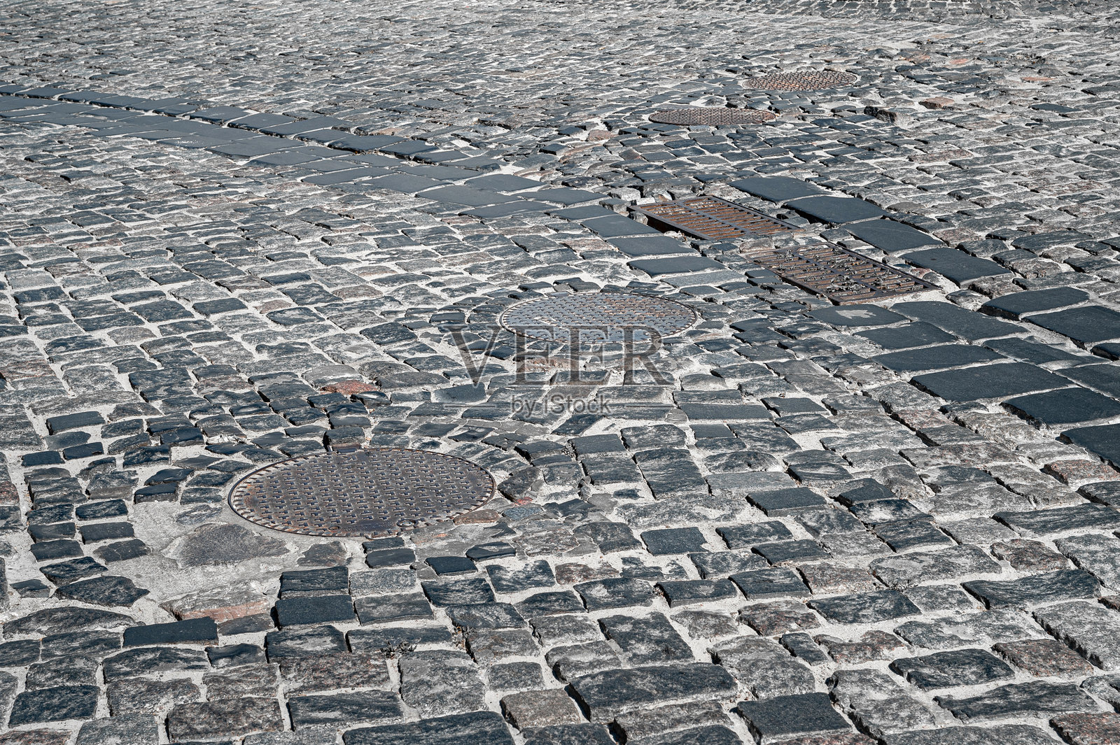 石块铺成的石头道路，砖石的纹理照片摄影图片
