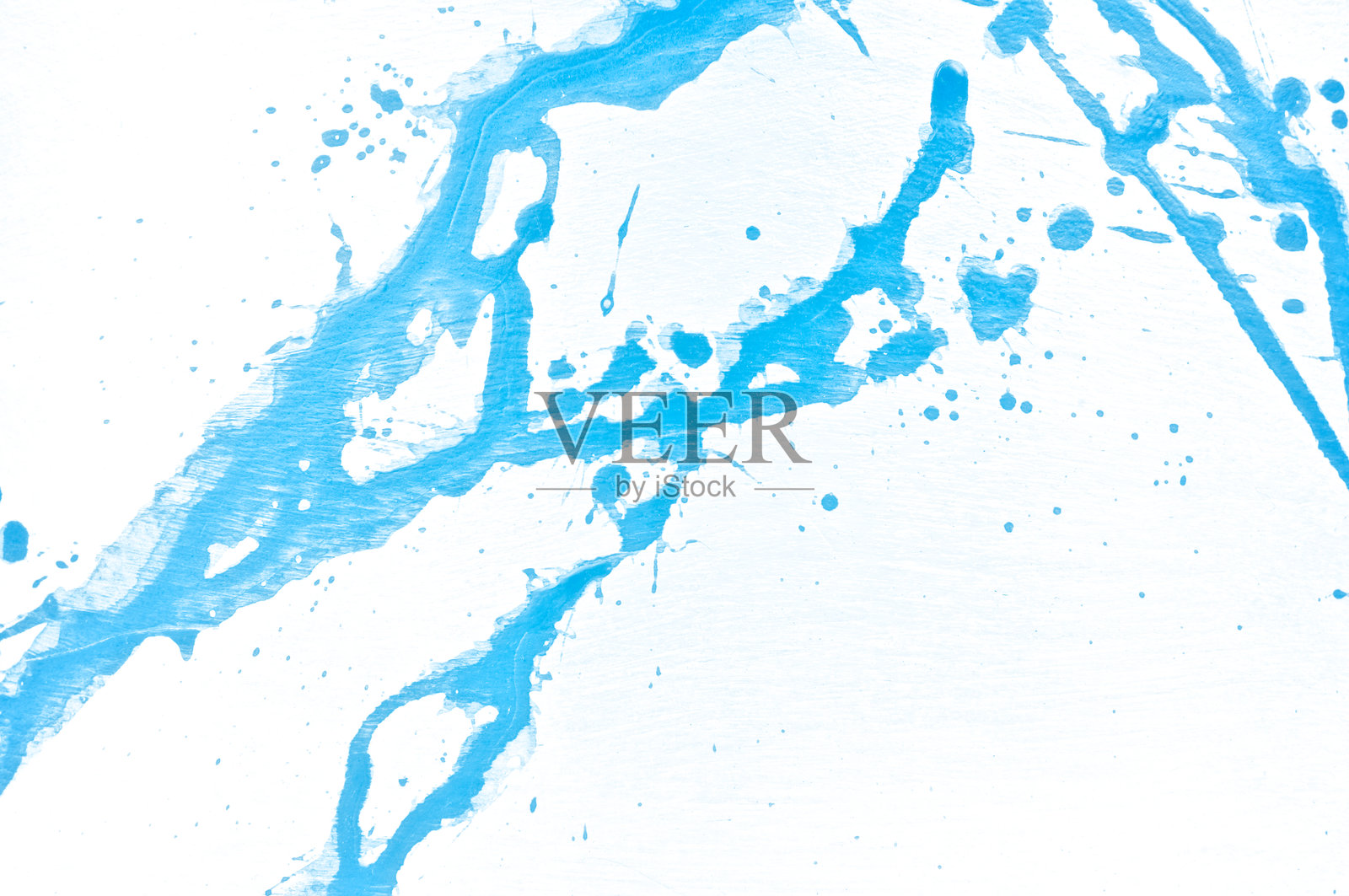 蓝色水彩背景。丙烯手绘的飞溅，独立于白色背景。抽象丙烯颜料飞溅。时尚与美丽。靛蓝色调。特写。照片摄影图片