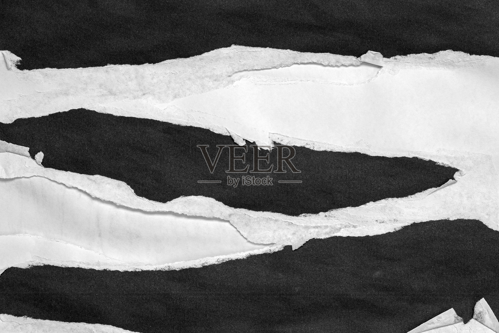 黑白撕裂纸拼贴风格，撕裂纸效果，纹理抽象背景，文本留白空间。照片摄影图片