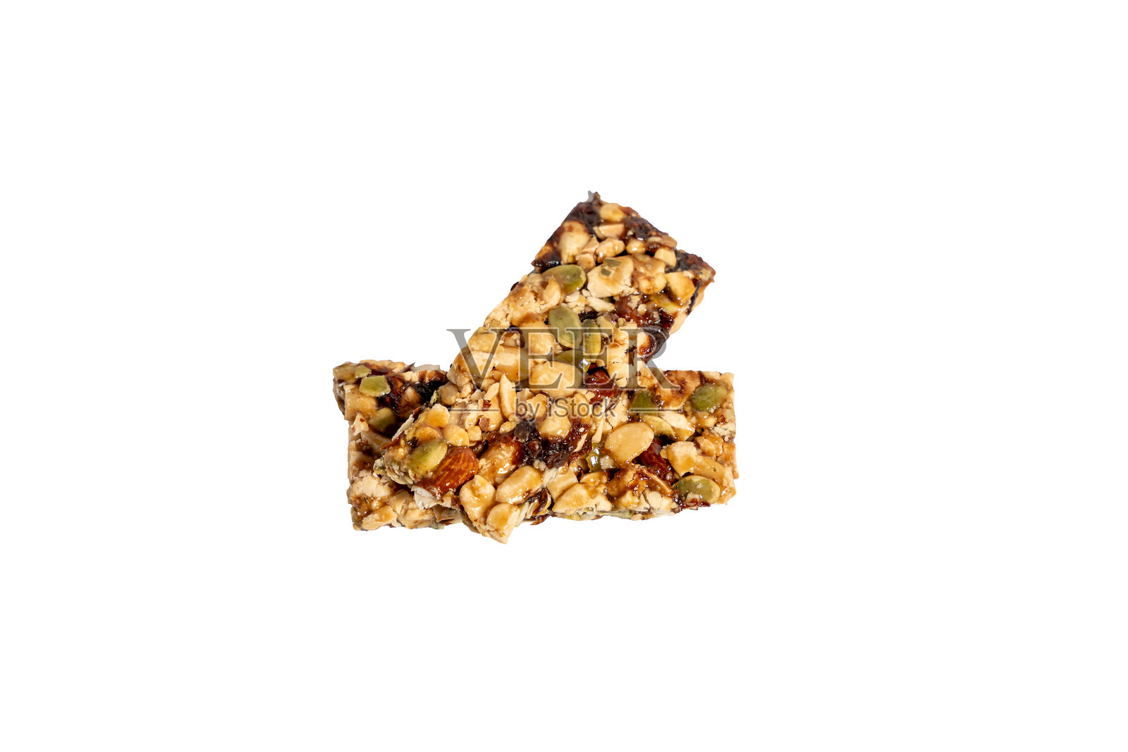 两根顶部撒有坚果和种子的燕麦棒，放在白色背景上，彼此不接触。照片摄影图片