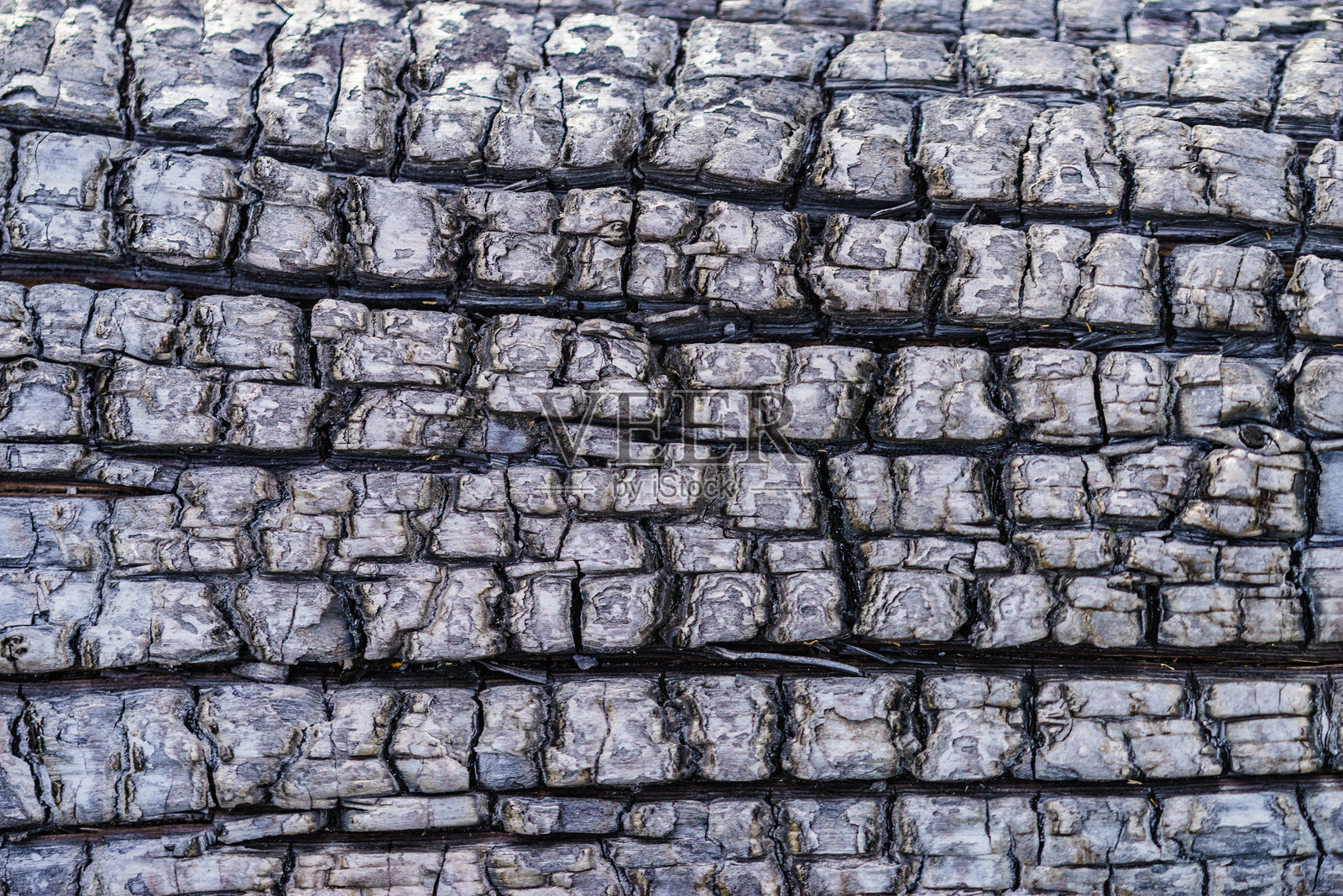 烧焦的冒烟木头作为背景照片摄影图片