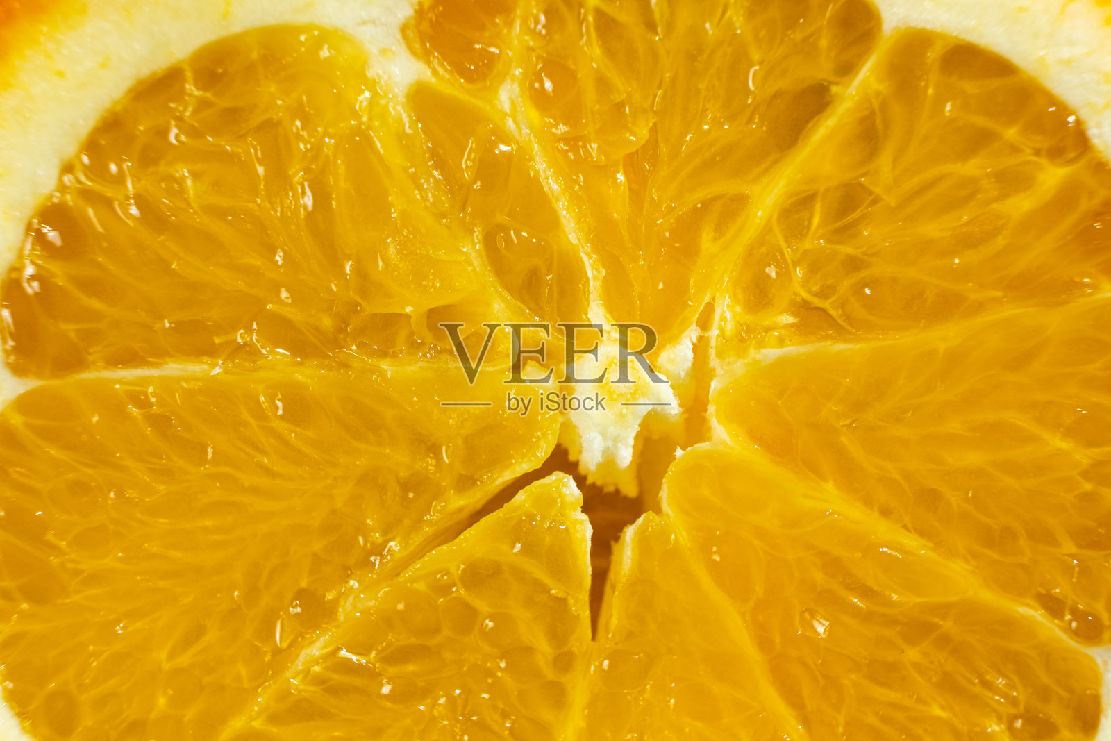 成熟新鲜橙子果肉的宏观纹理。照片摄影图片