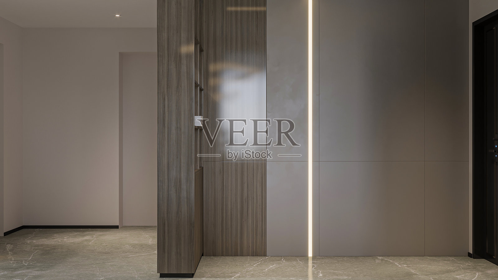 极简现代的入口走廊，配有木质装饰墙和线性照明照片摄影图片