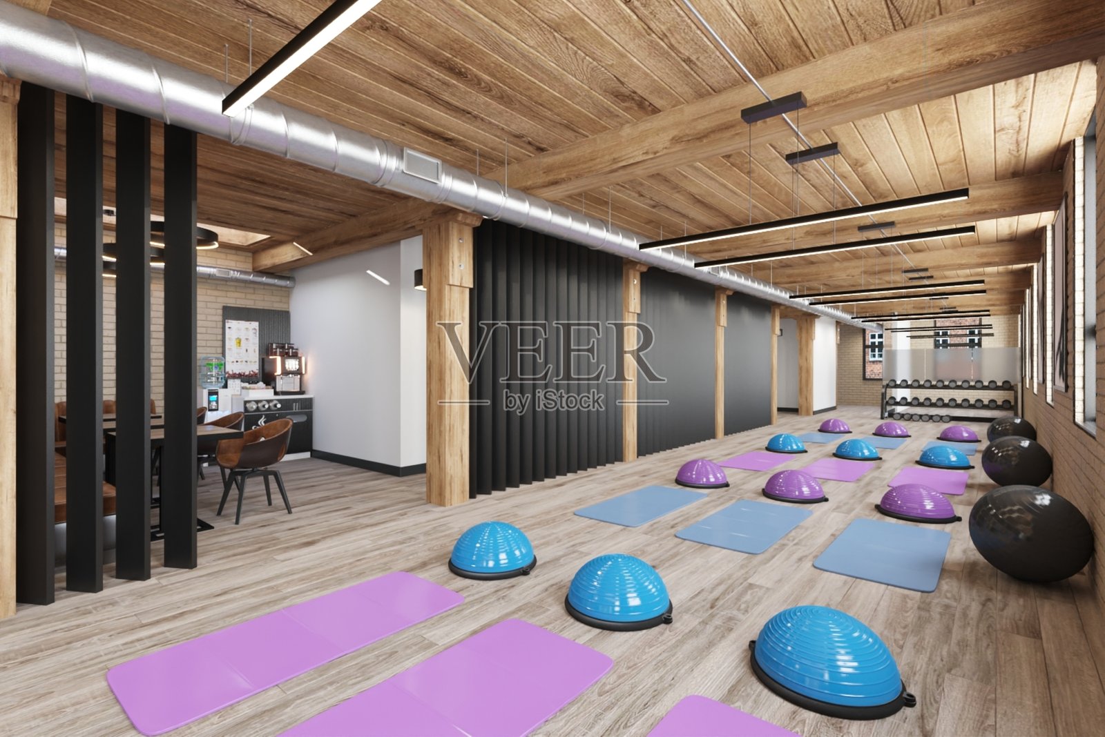 现代健身工作室，配备普拉提器材和时尚的木质内饰照片摄影图片