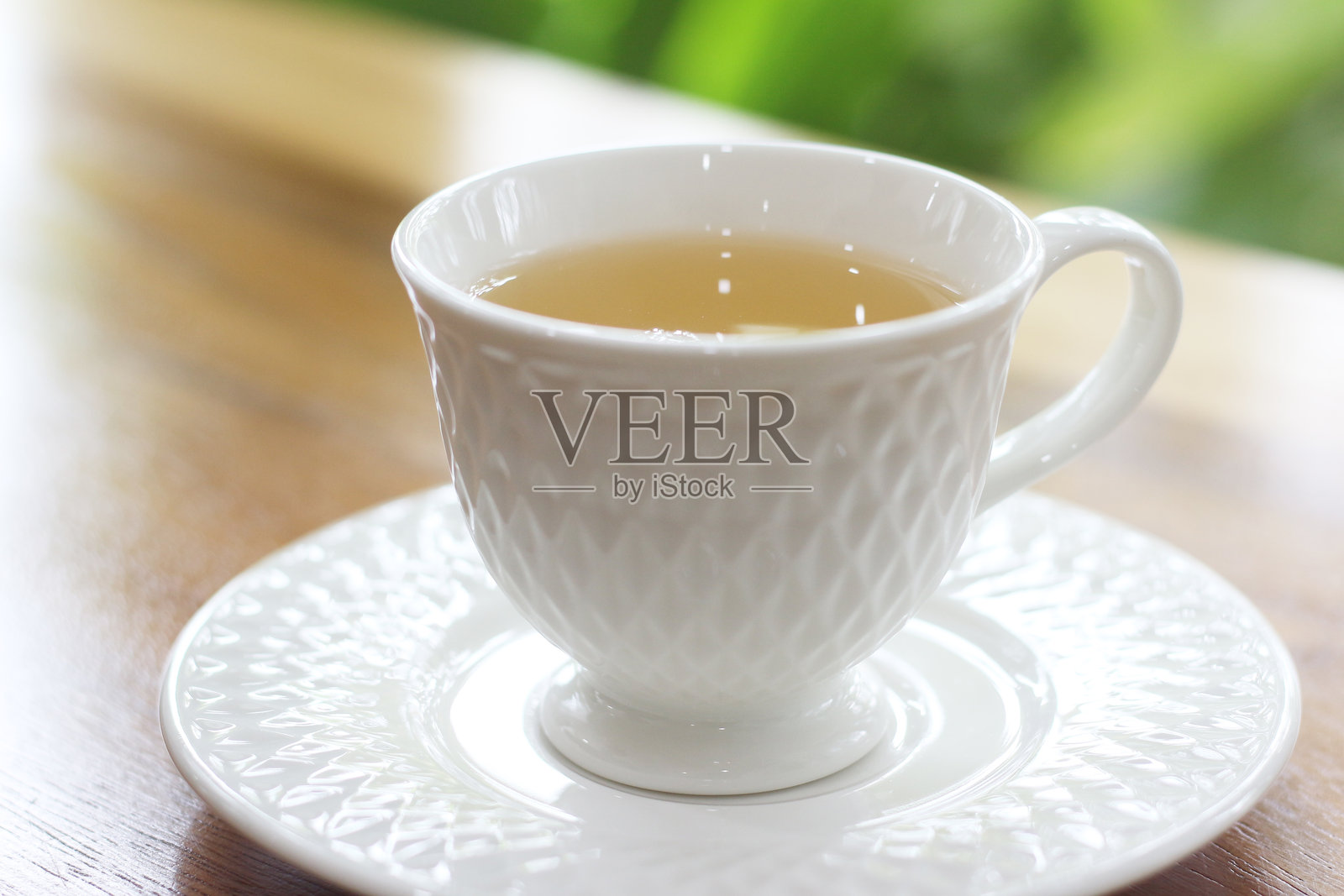 陶瓷杯中的茶照片摄影图片