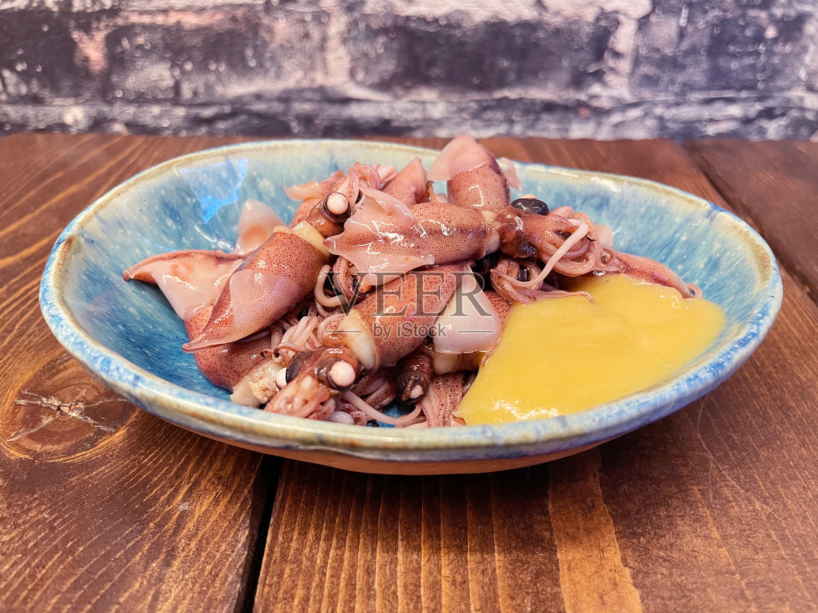 火焰乌贼配醋味味噌照片摄影图片