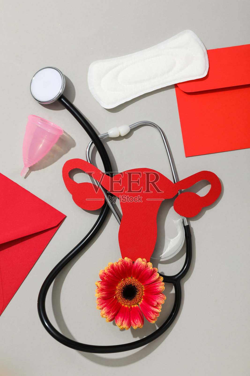 女性健康与女性医疗概念，带有子宫图案照片摄影图片