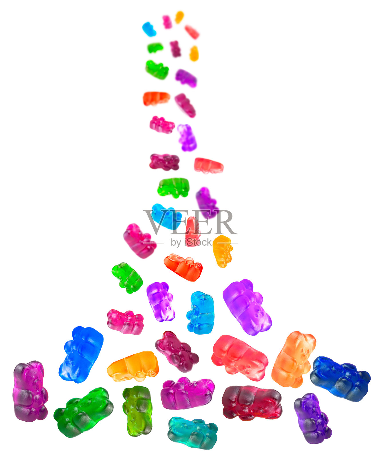 一群飞翔的五彩果冻熊，背景为白色。果酱熊，果冻糖果。照片摄影图片