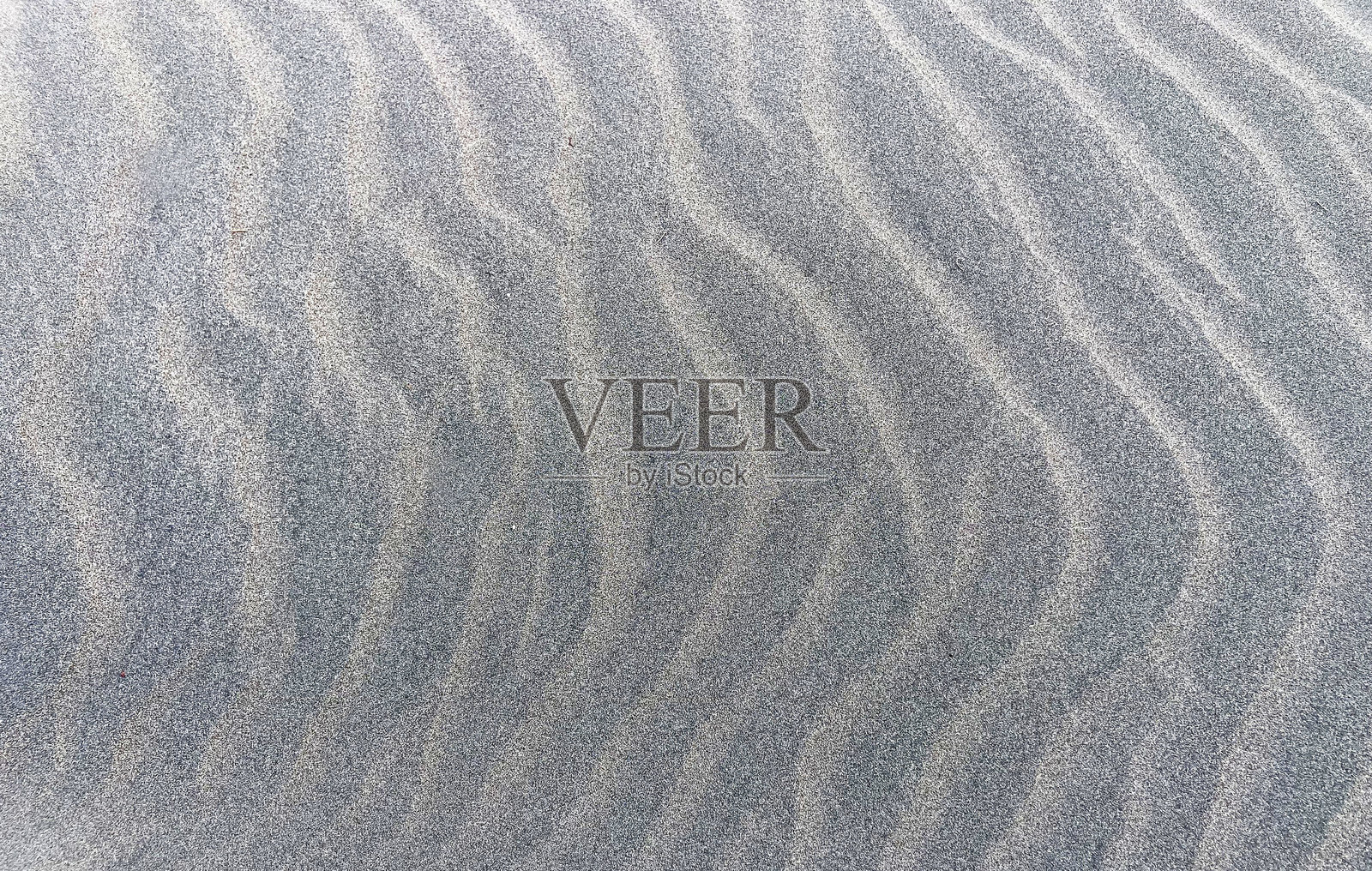 特内里费岛埃尔梅达诺的蒙塔尼亚佩拉达海滩上的火山沙丘。照片摄影图片