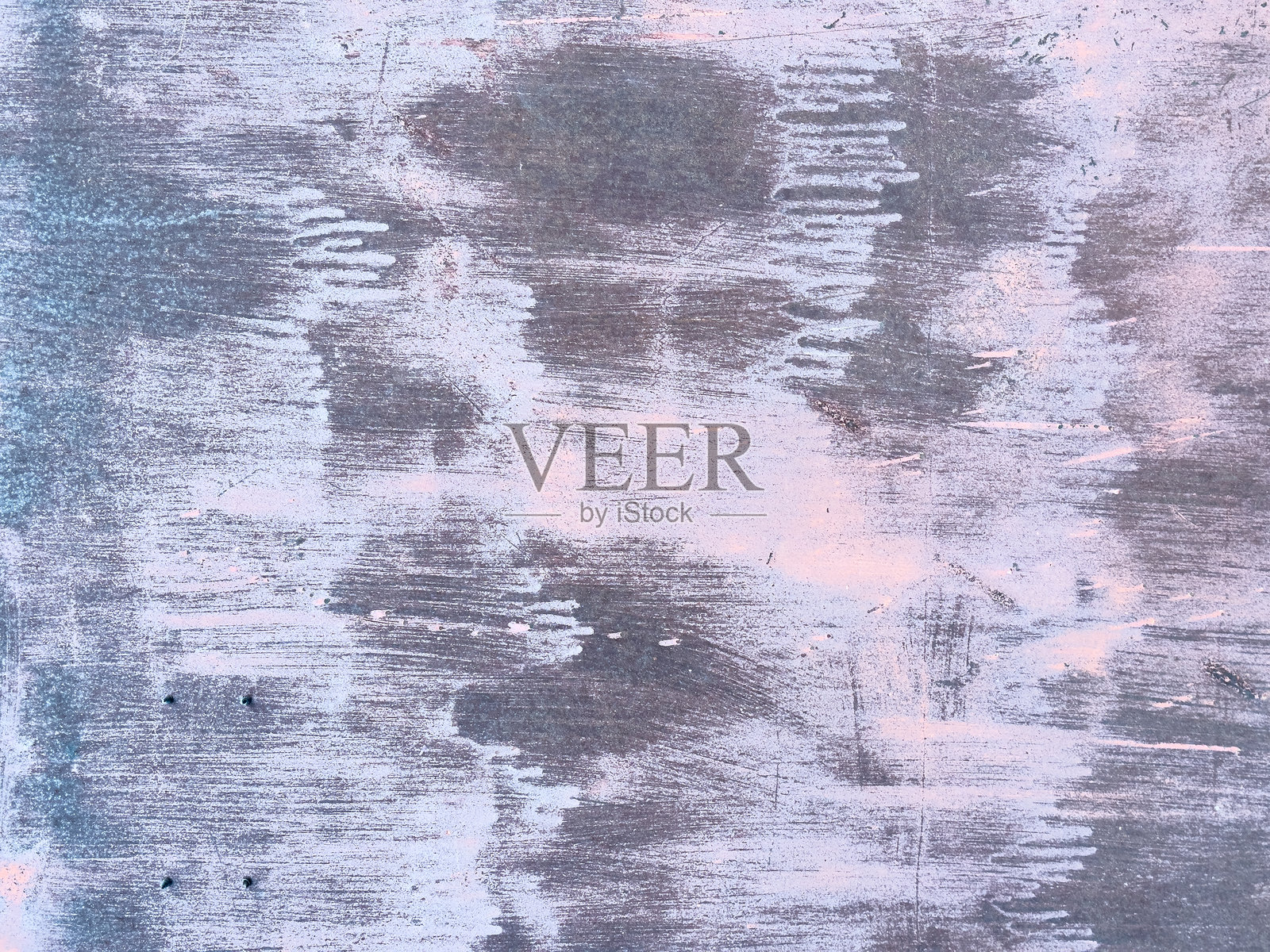 风化的金属表面显示出锈蚀和涂层层次照片摄影图片