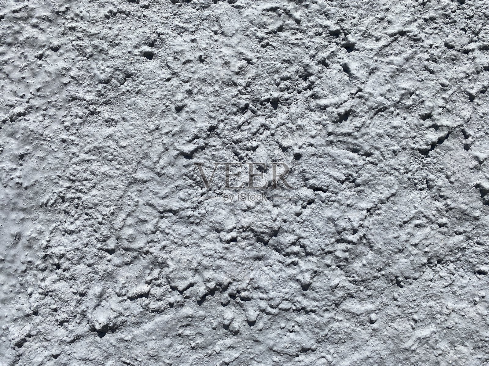 带有自然瑕疵和细微裂缝的粗糙水泥表面的尘土混凝土纹理。老旧、尘土的表面呈现出工业氛围，非常适合极简设计。地面纹理。墙面背景。照片摄影图片