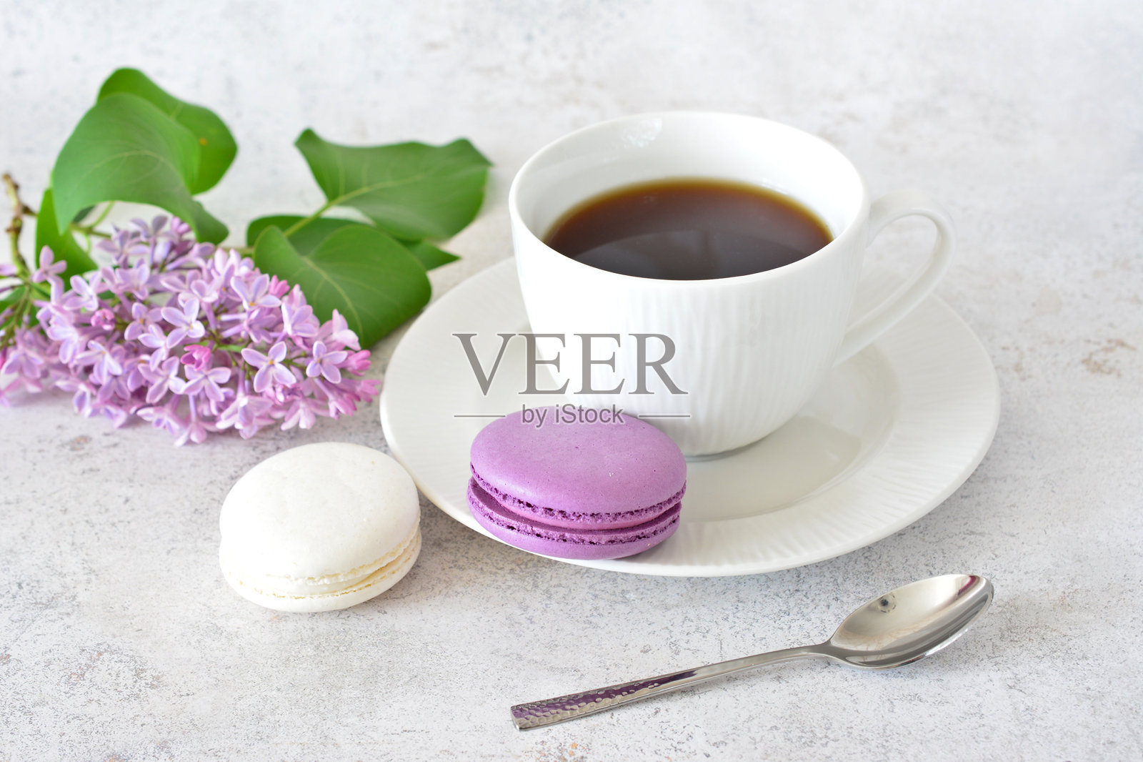 早晨的咖啡和粉彩色马卡龙照片摄影图片