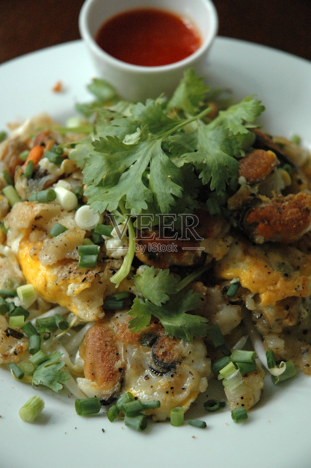 炸贻贝煎蛋卷照片摄影图片