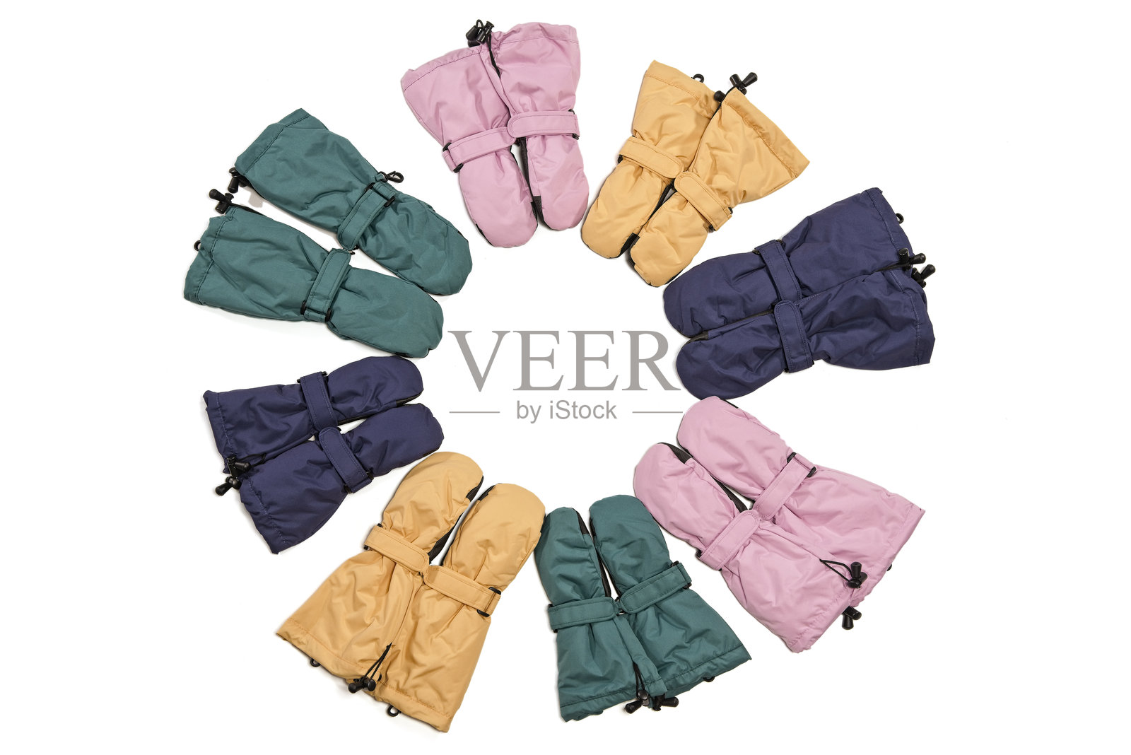 儿童用的温暖防水彩色冬季手套剪裁图照片摄影图片