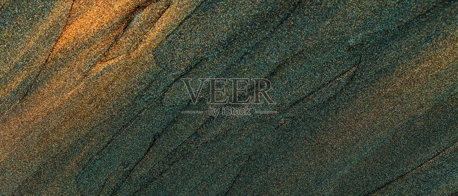 金色绿色背景，闪闪发光的涂抹，金色画笔纹理照片摄影图片